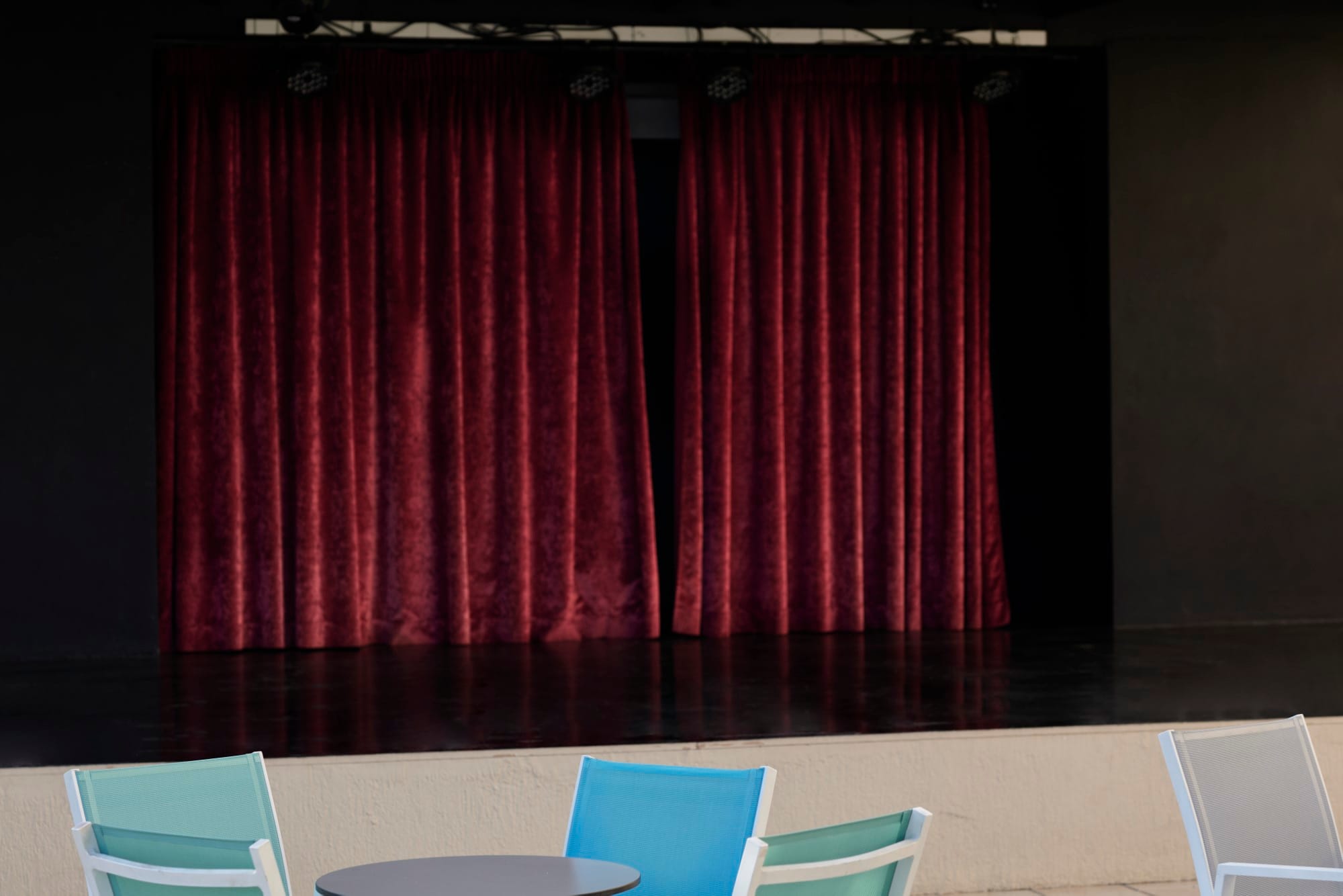 a room with a red curtain