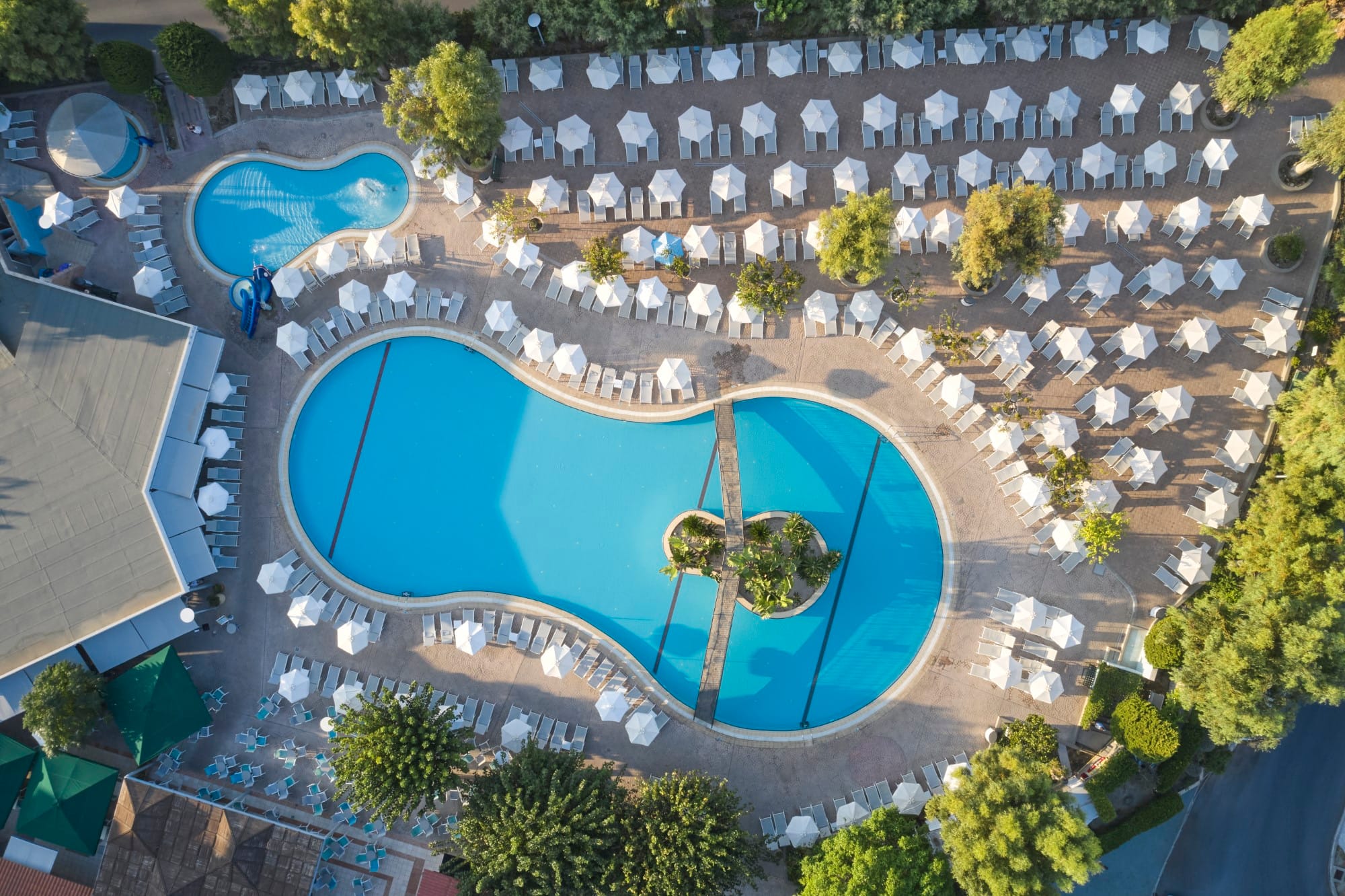 a pool surrounded by trees