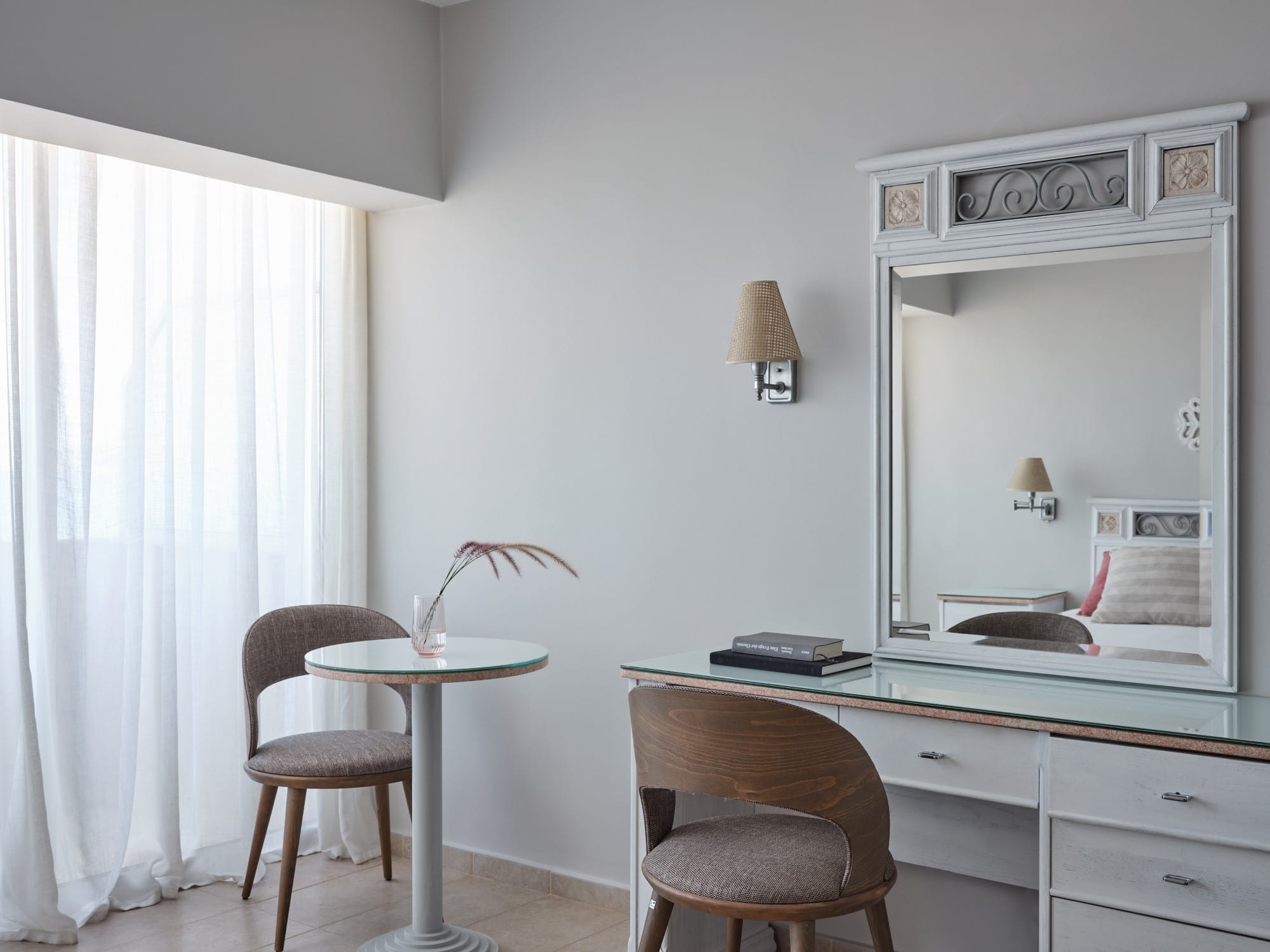 a room with a table and chairs