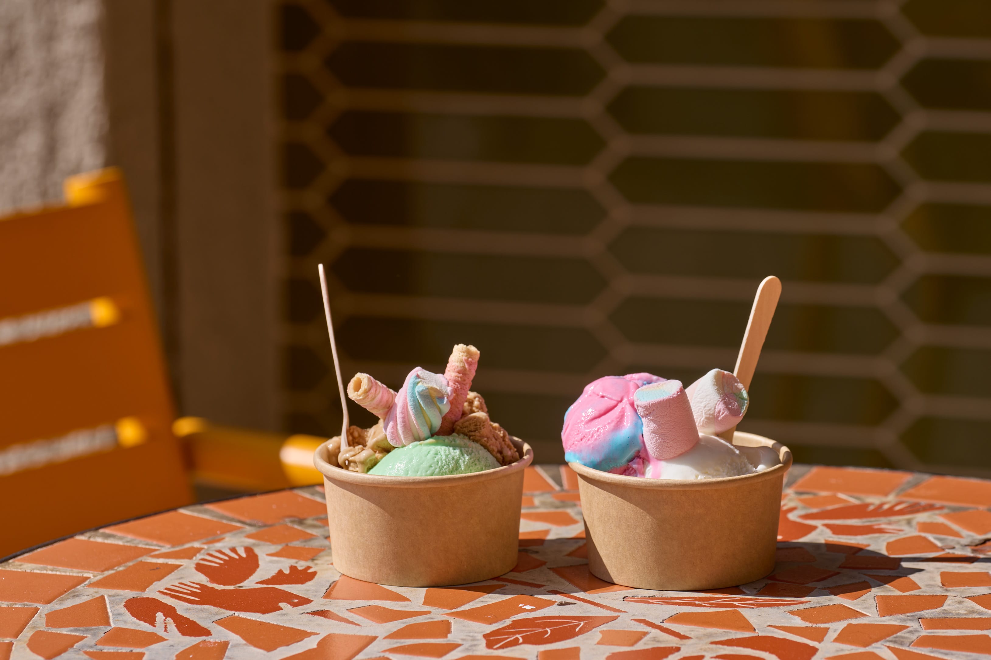 a group of small cups with pink liquid in them