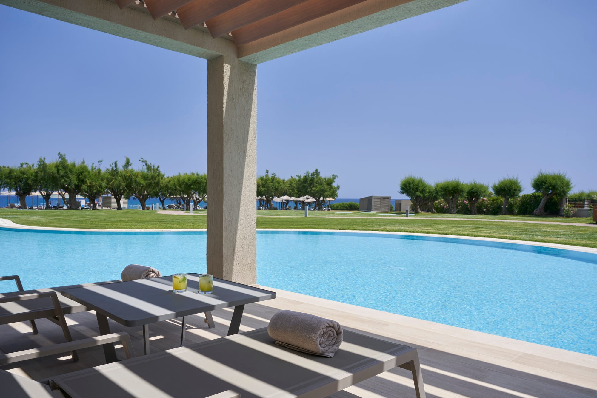 a pool with chairs around it