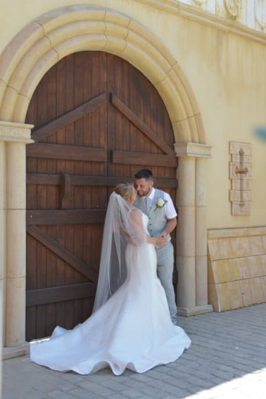 a man and woman kissing