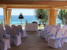 a room with chairs and a table