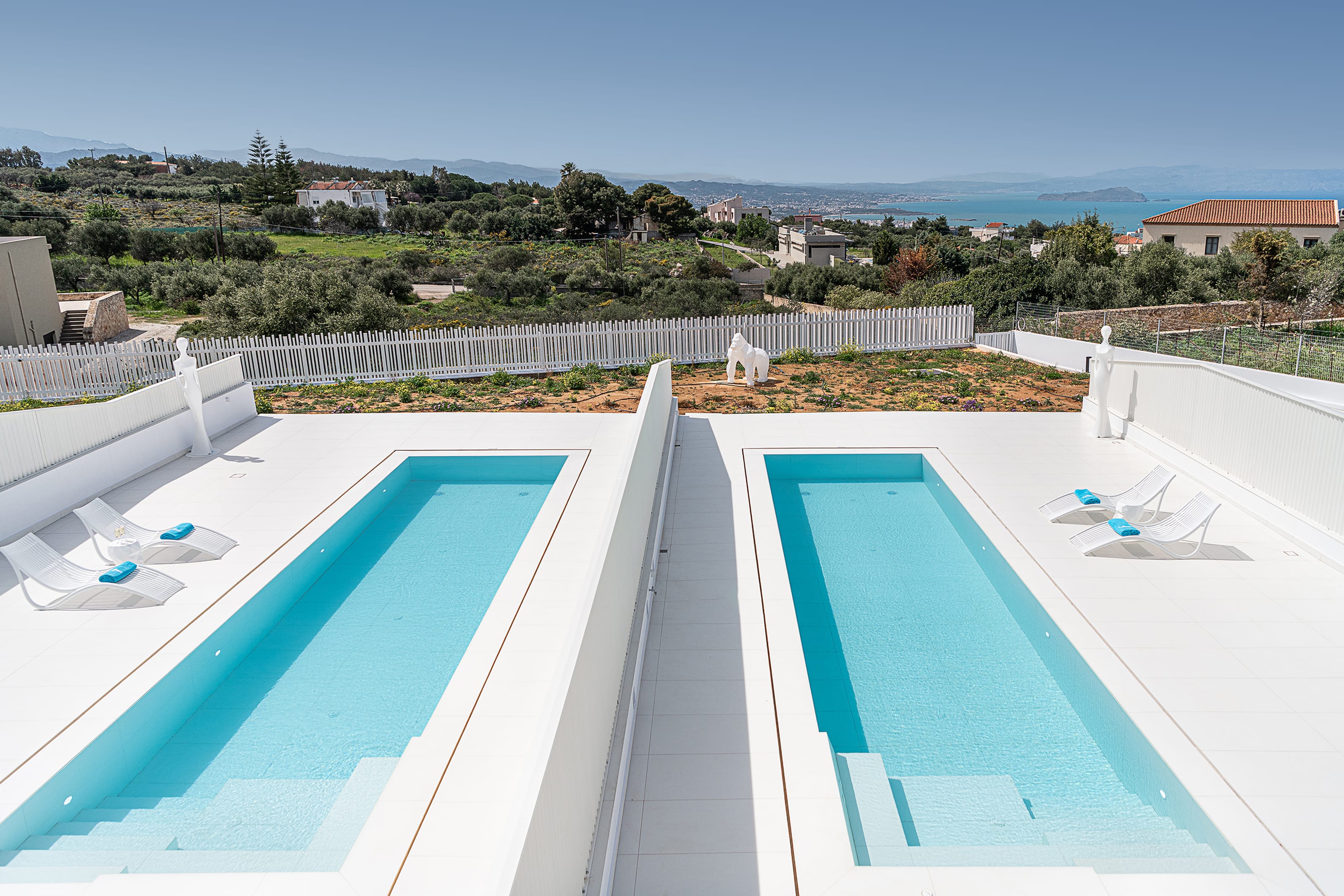 a swimming pool with a fence around it