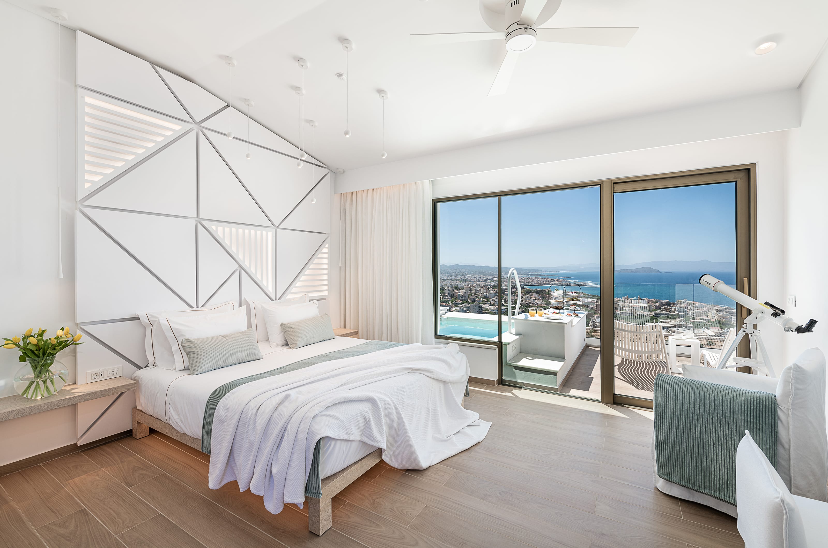 a bedroom with a large window