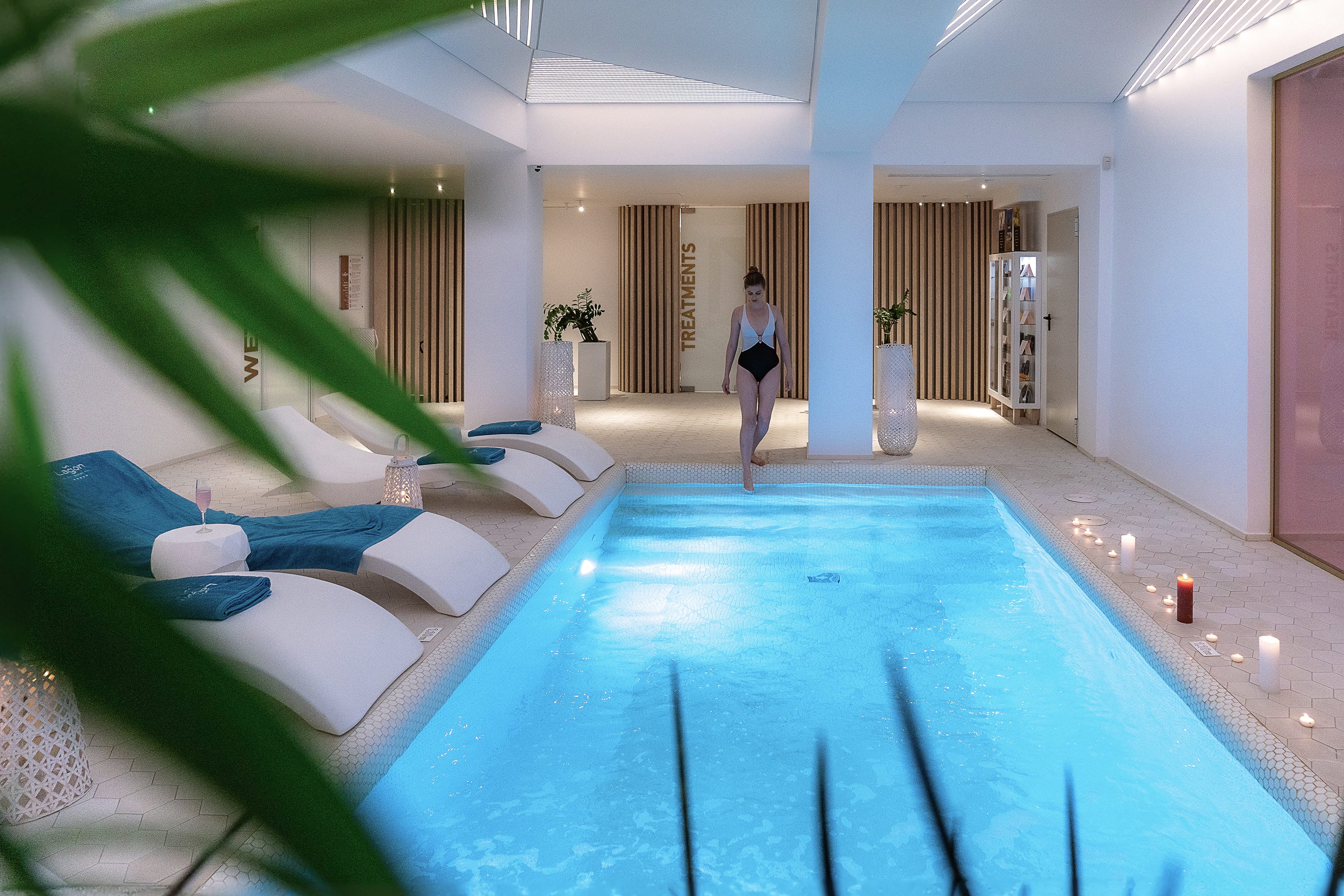 a person walking in a swimming pool