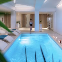 a person walking in a swimming pool