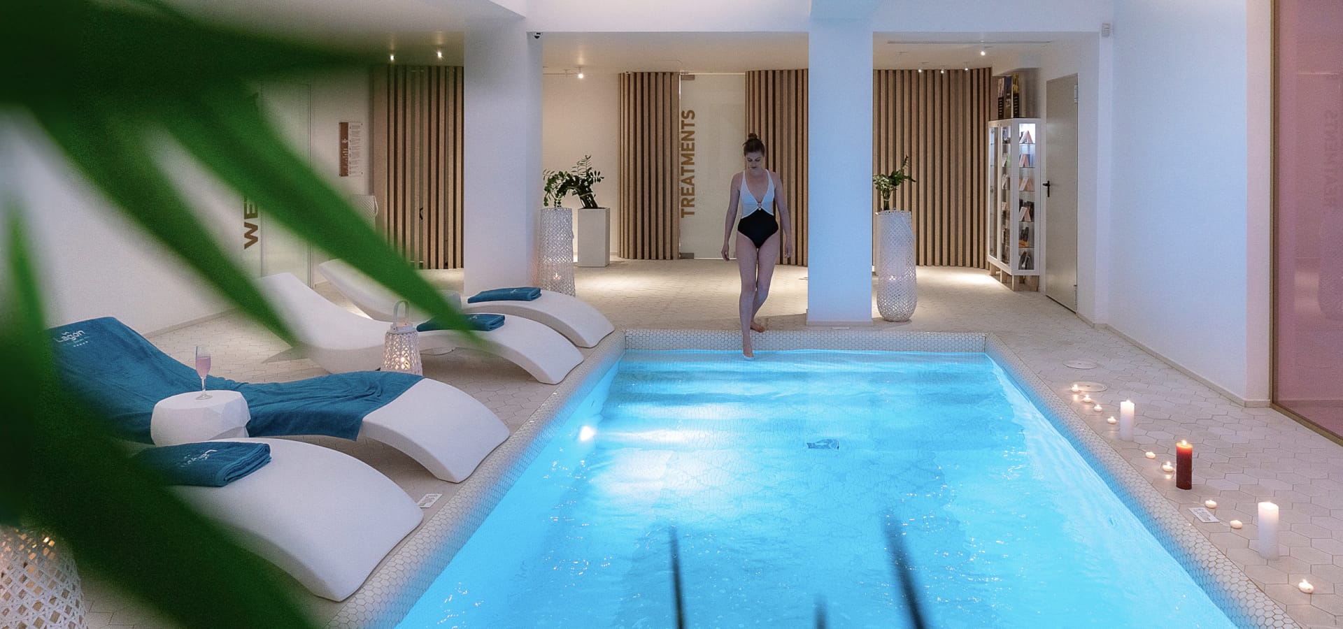 a person walking in a swimming pool