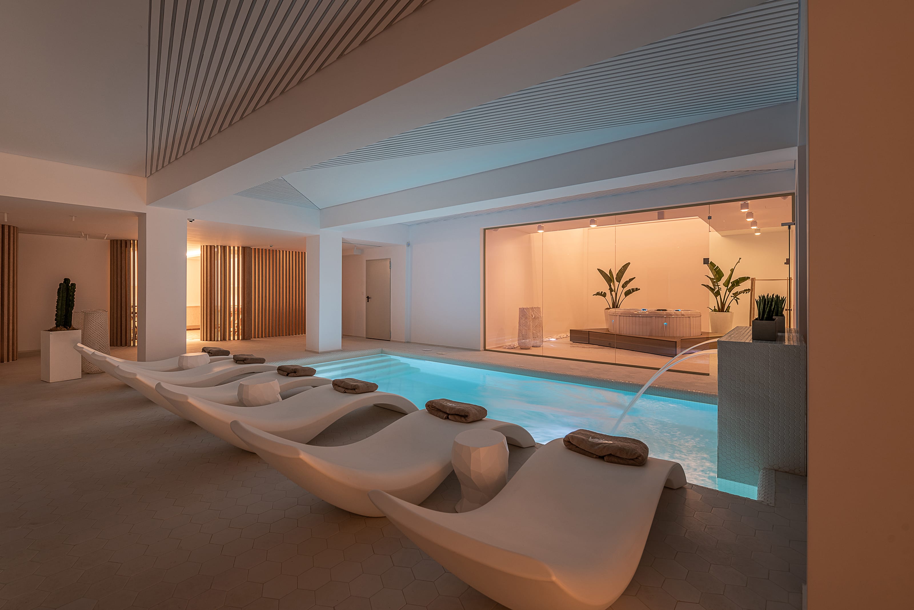 a large room with a large pool