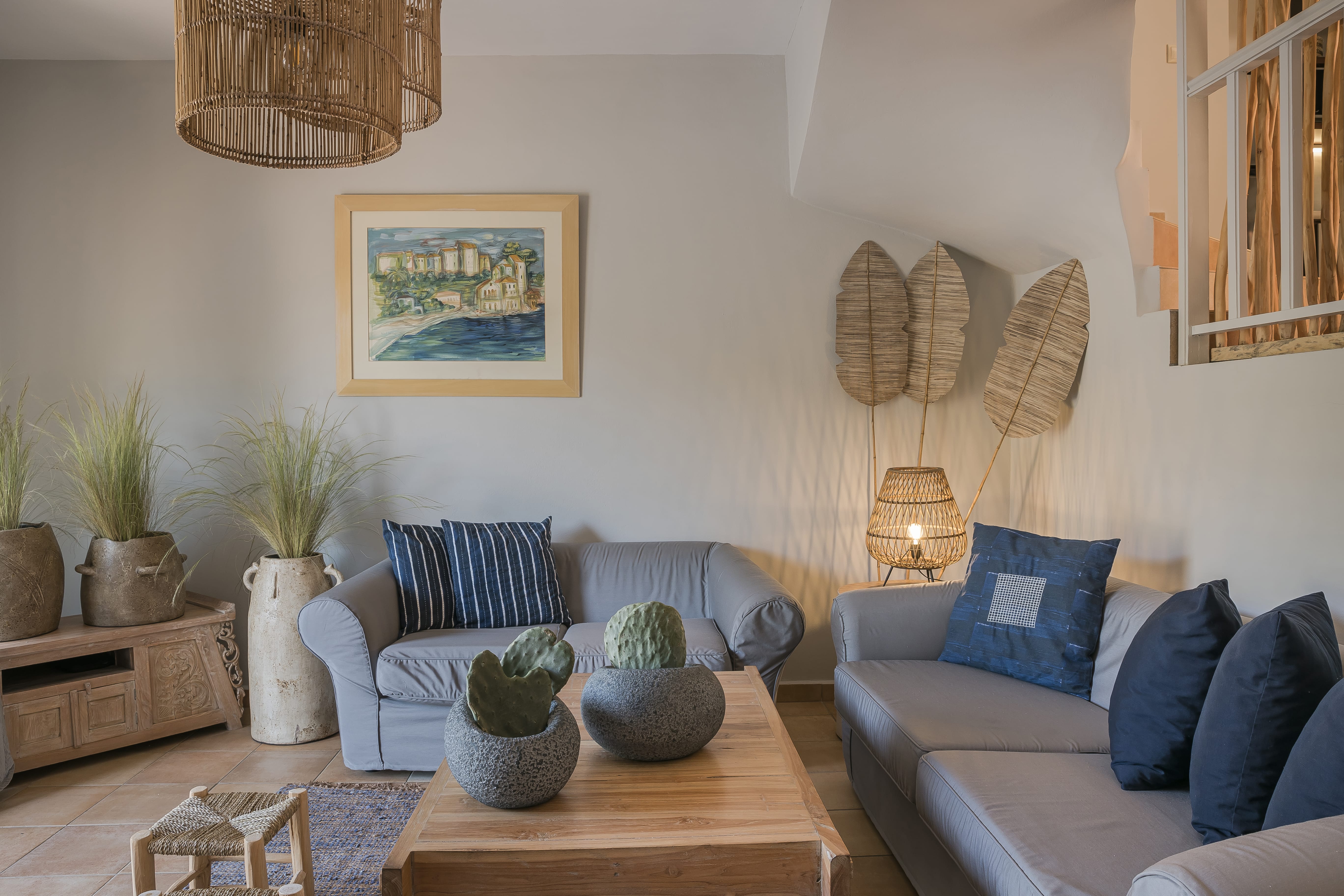 a living room with a couch and a table