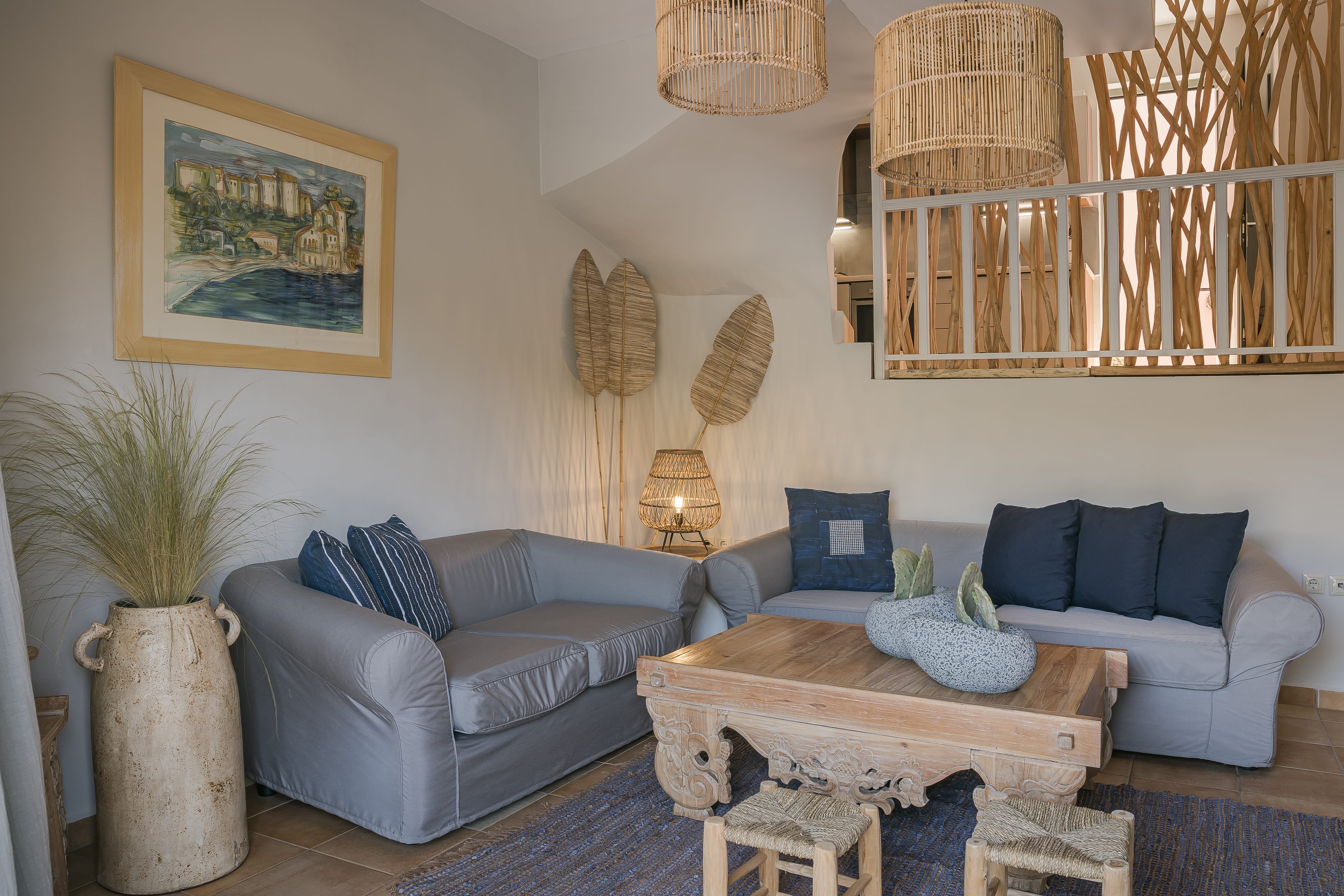 a living room with a couch and a table