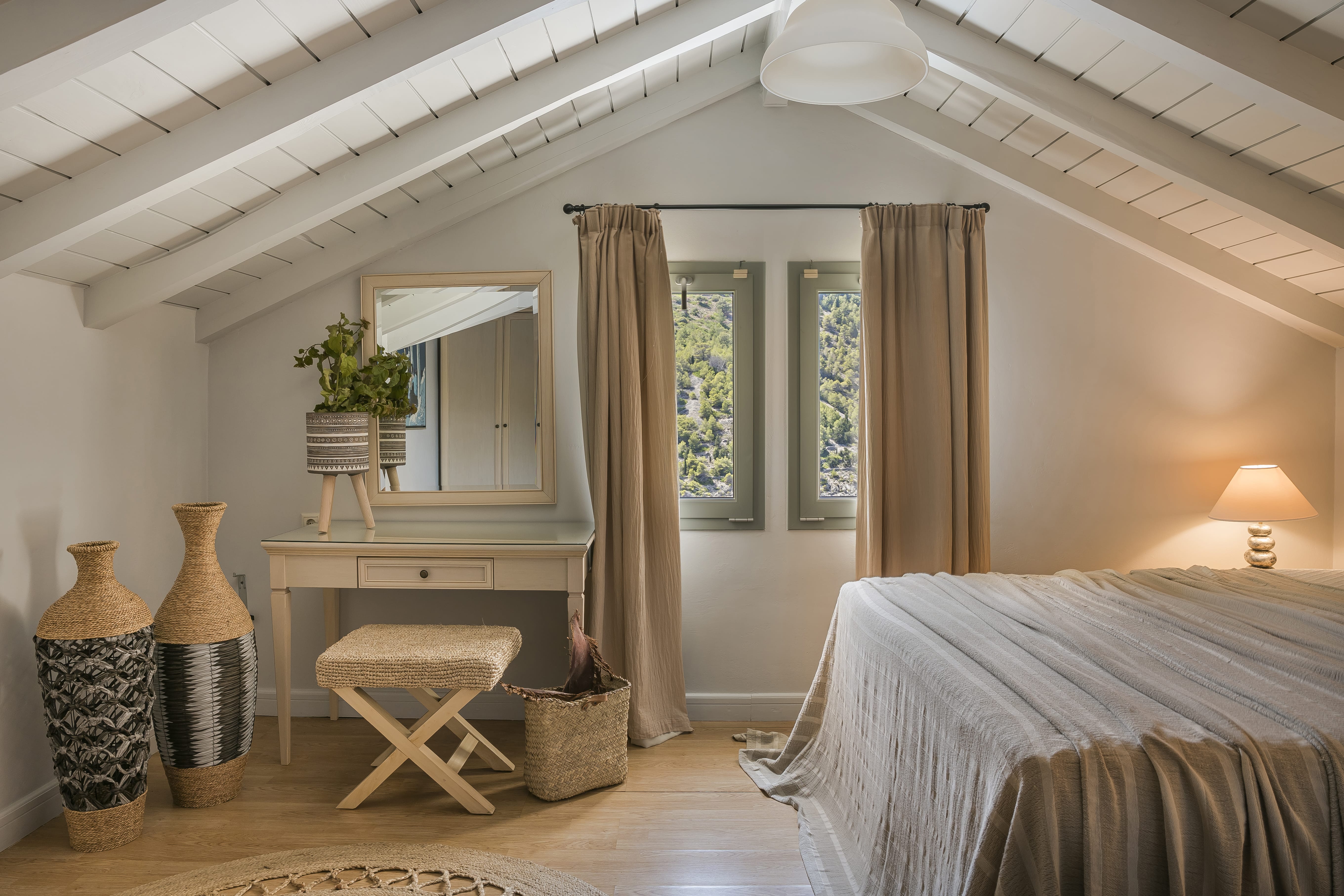 a bedroom with a bed and a table