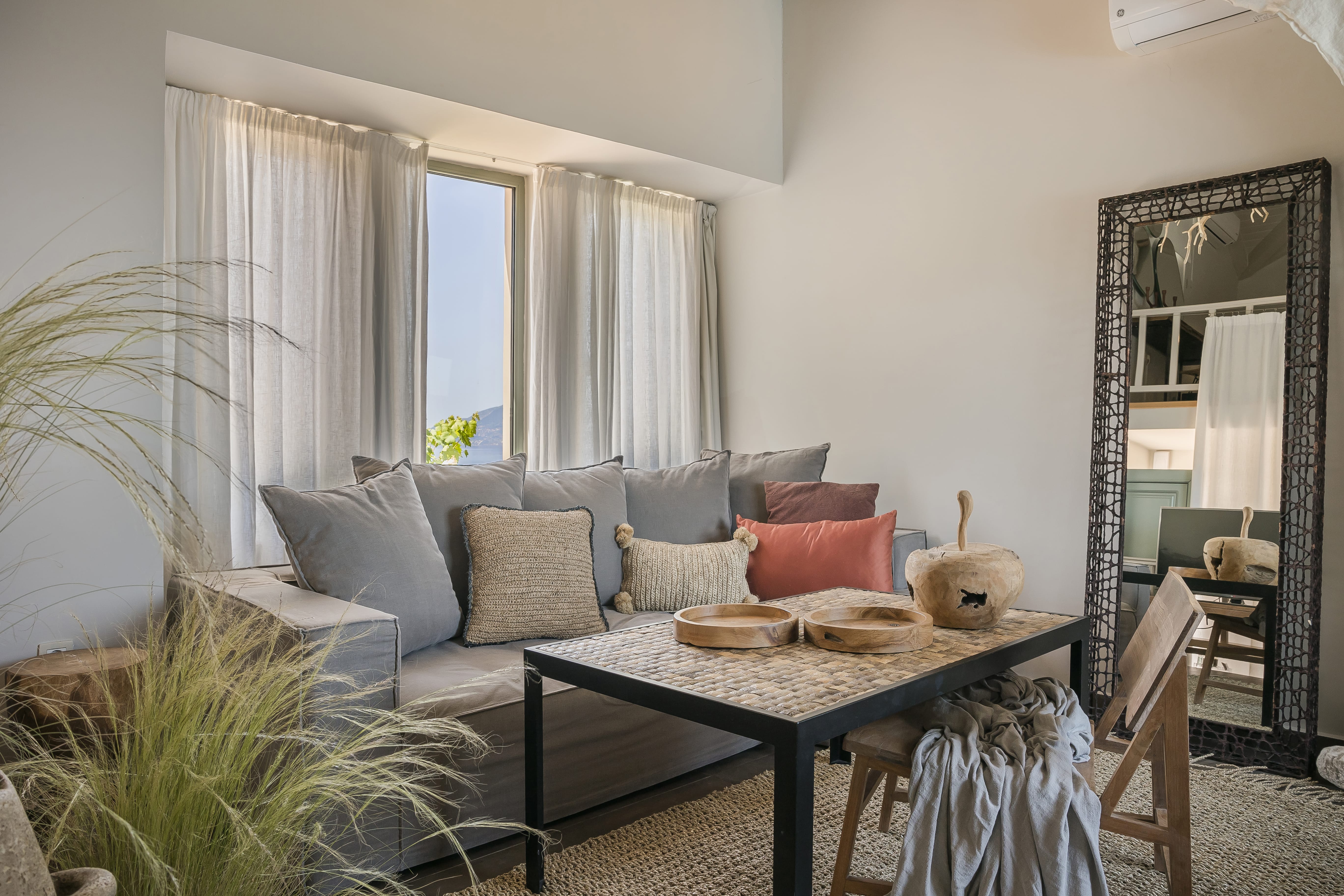 a living room with a couch and a table