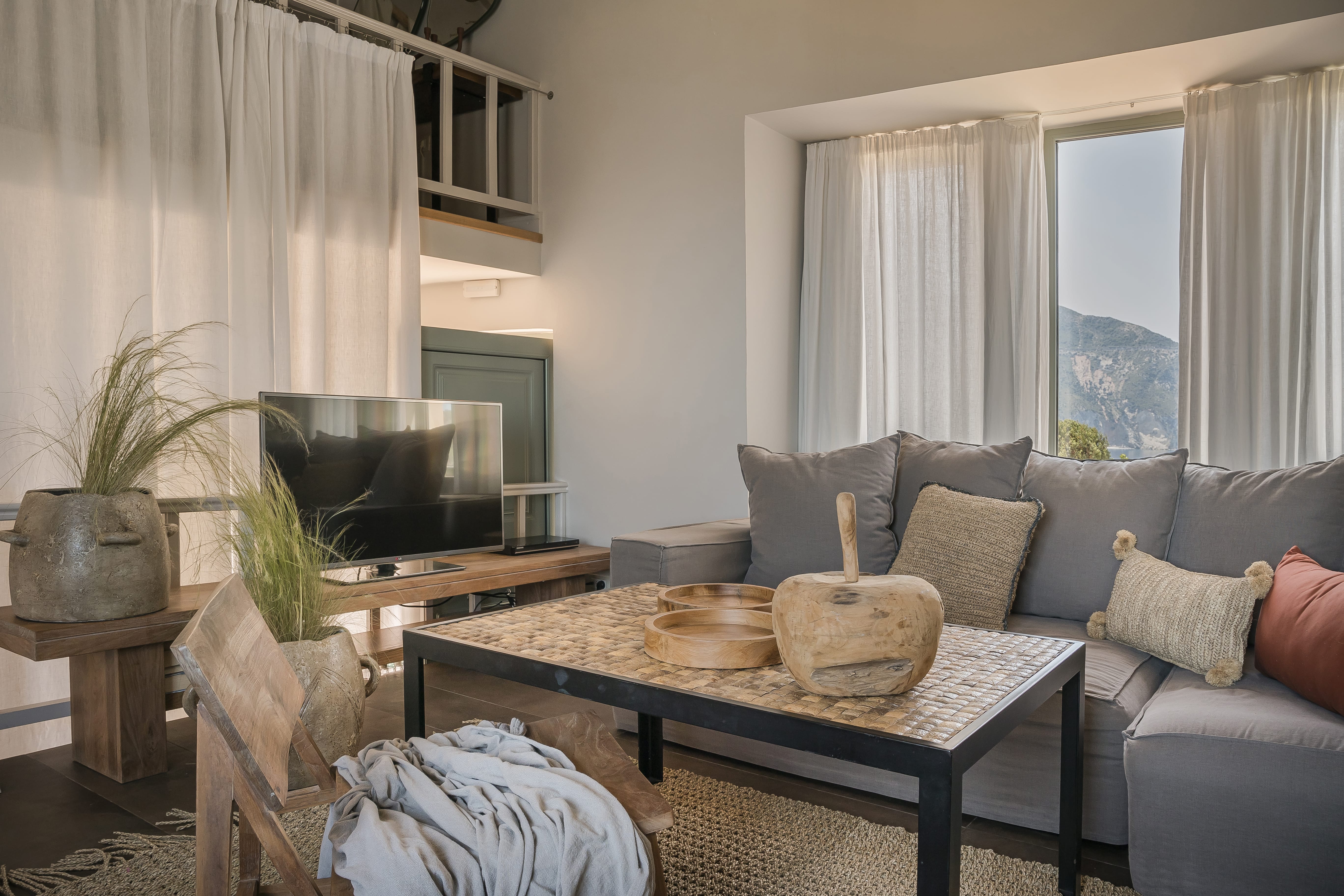 a living room with a couch and a table