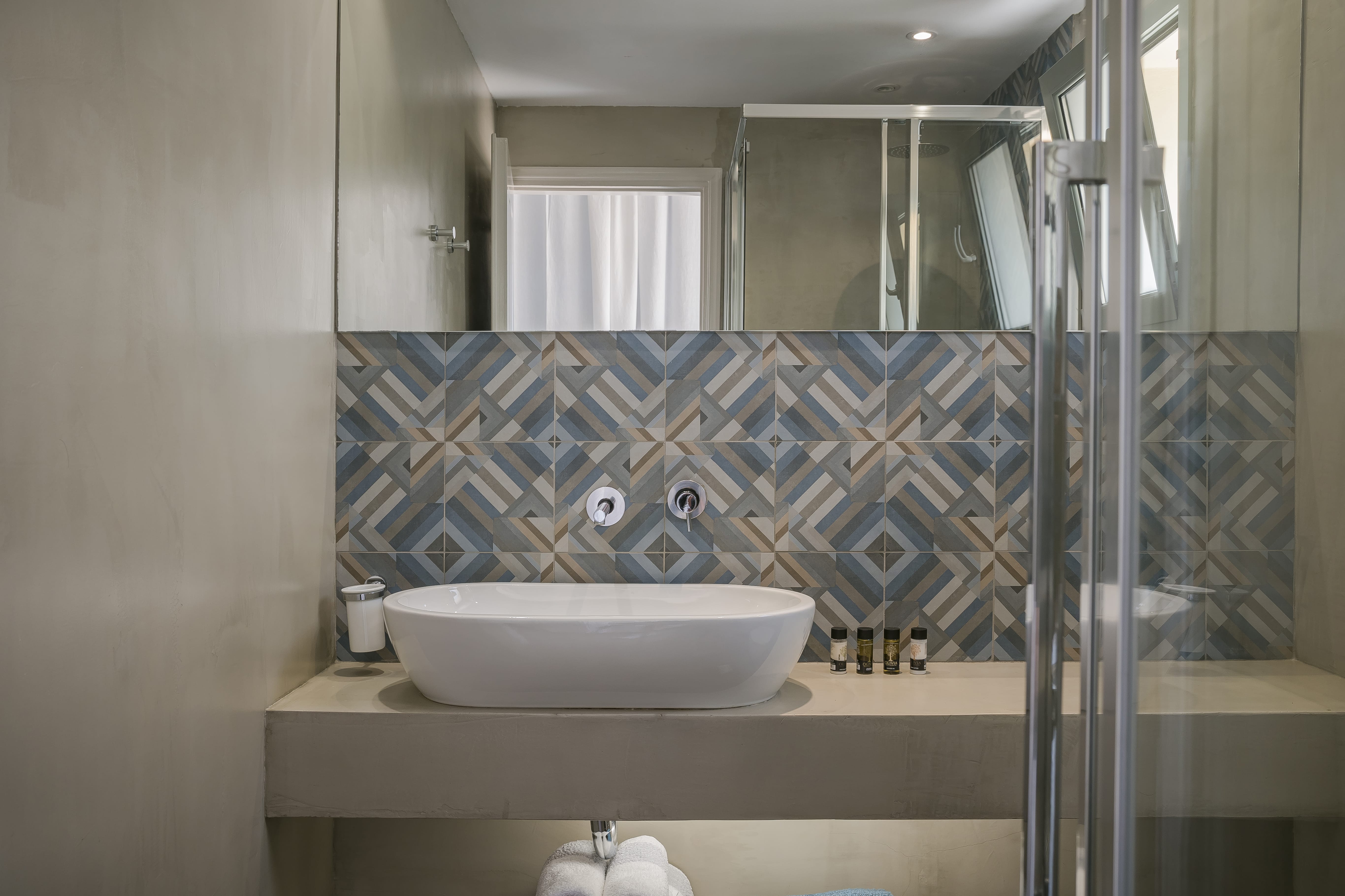 a bathroom with a glass shower