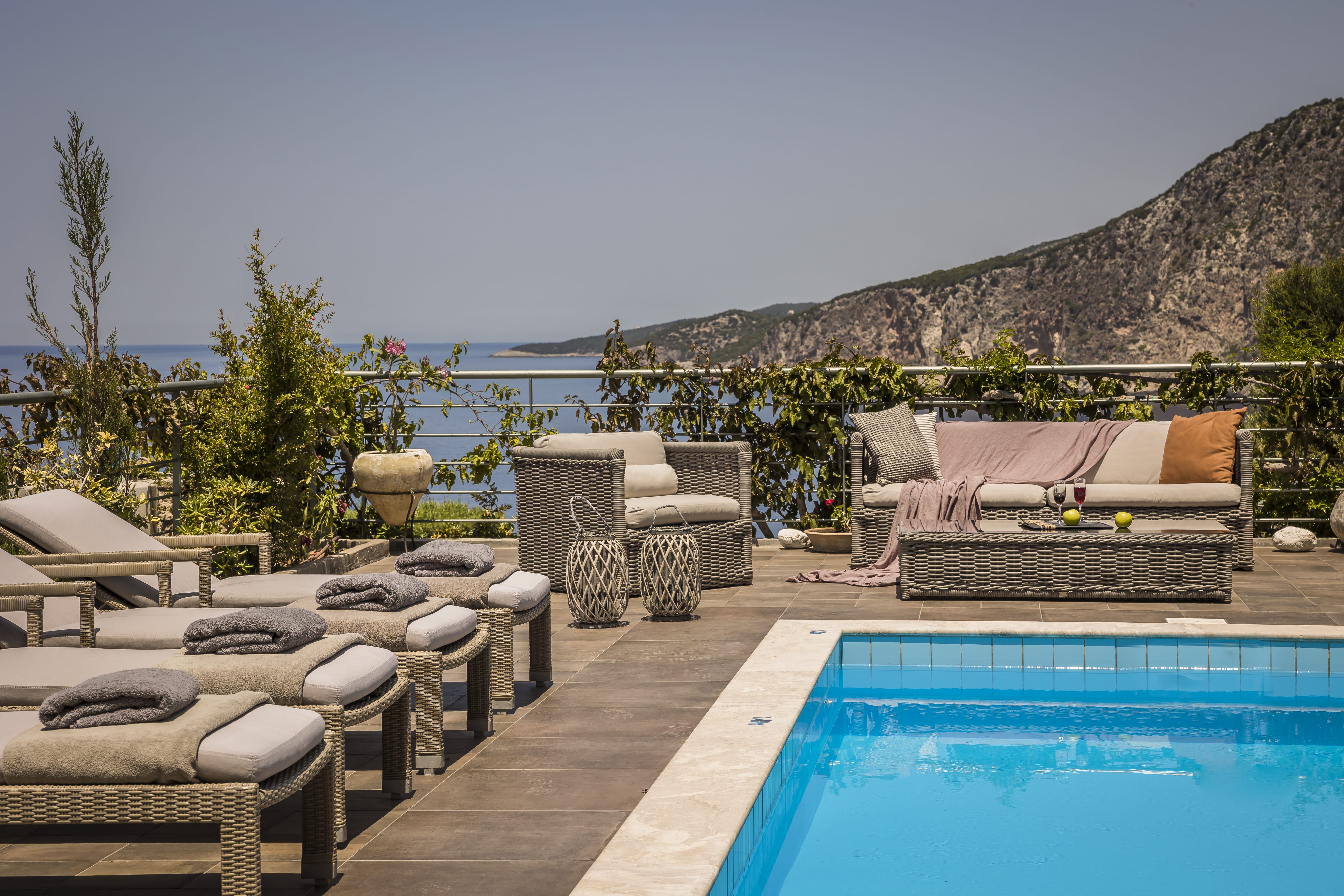 a pool with chairs around it