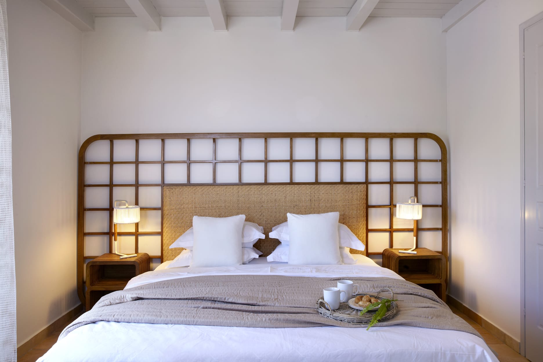 a hotel room with two beds