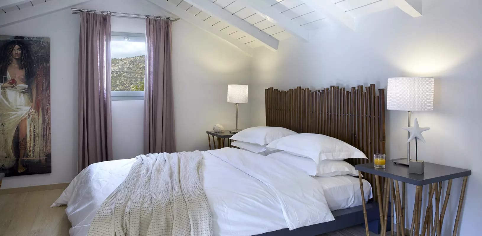 a hotel room with two beds