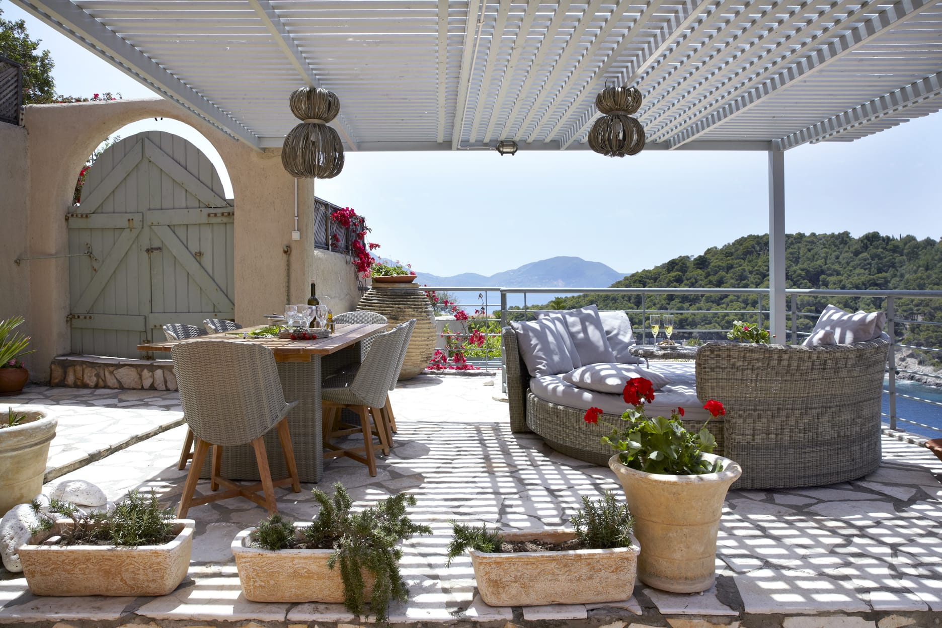 a patio with a table and chairs