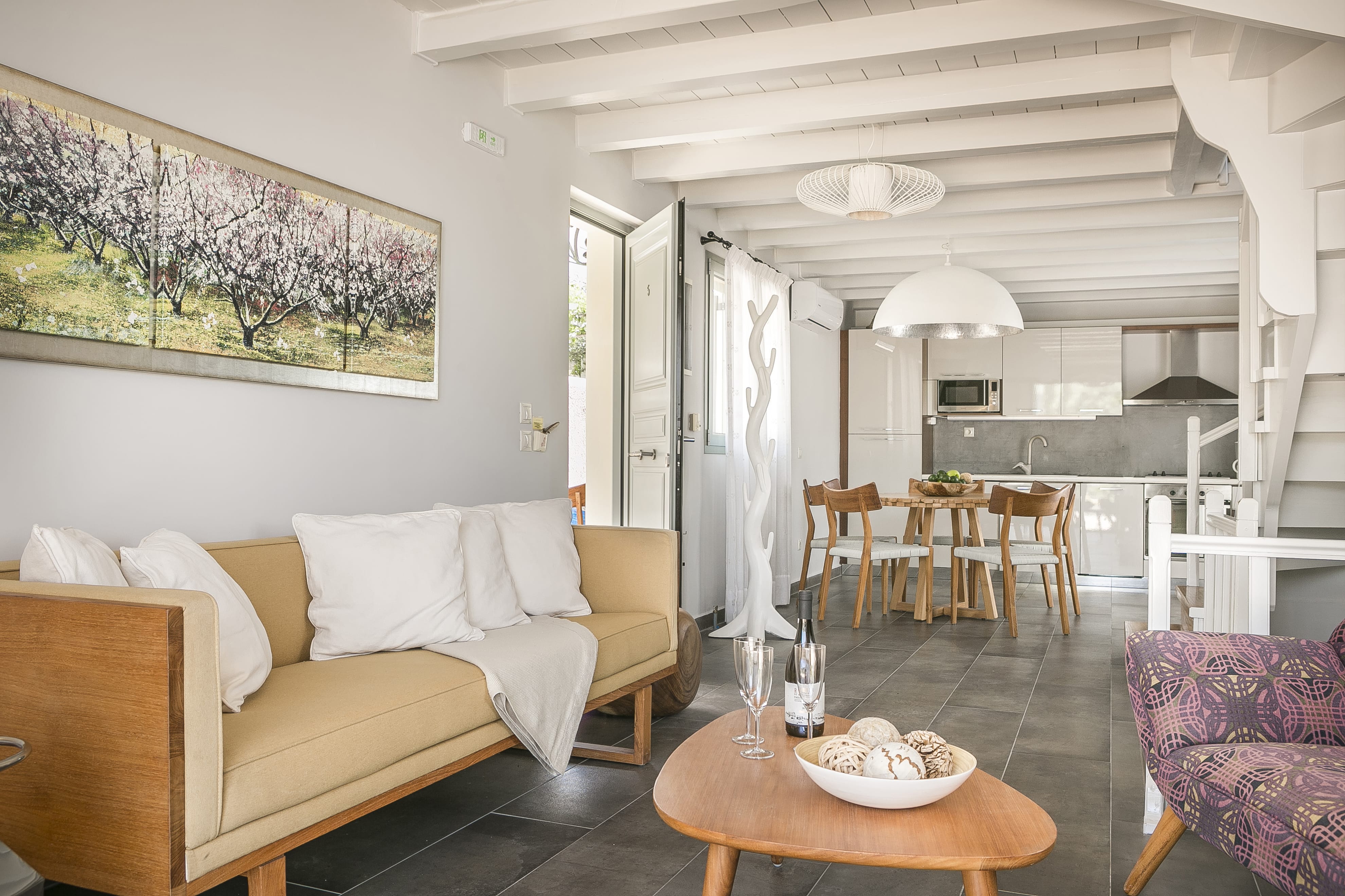 a living room with a couch and a table