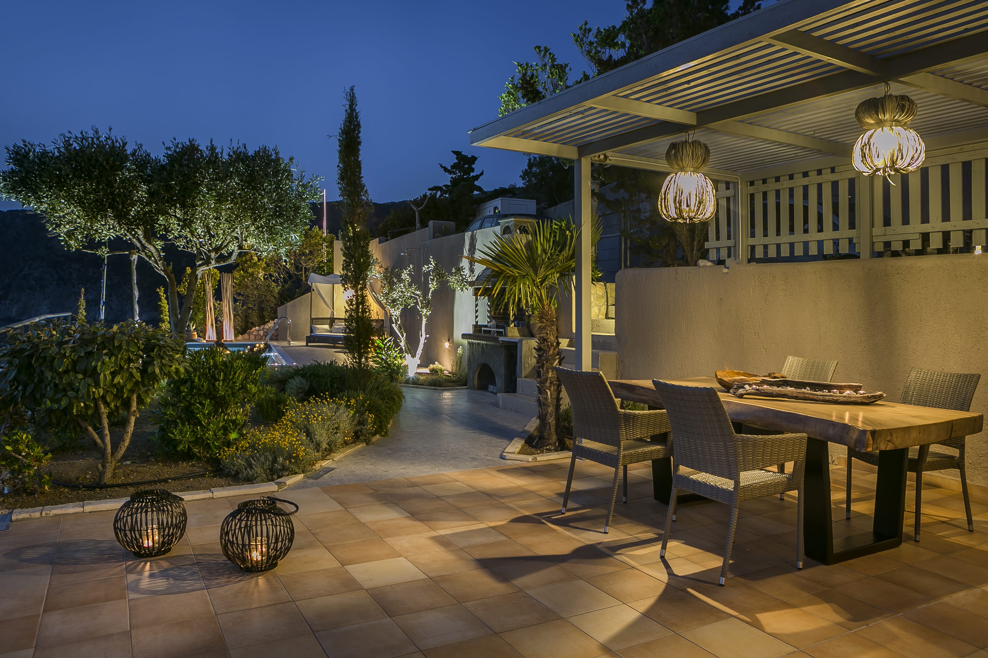 a patio with a table and chairs
