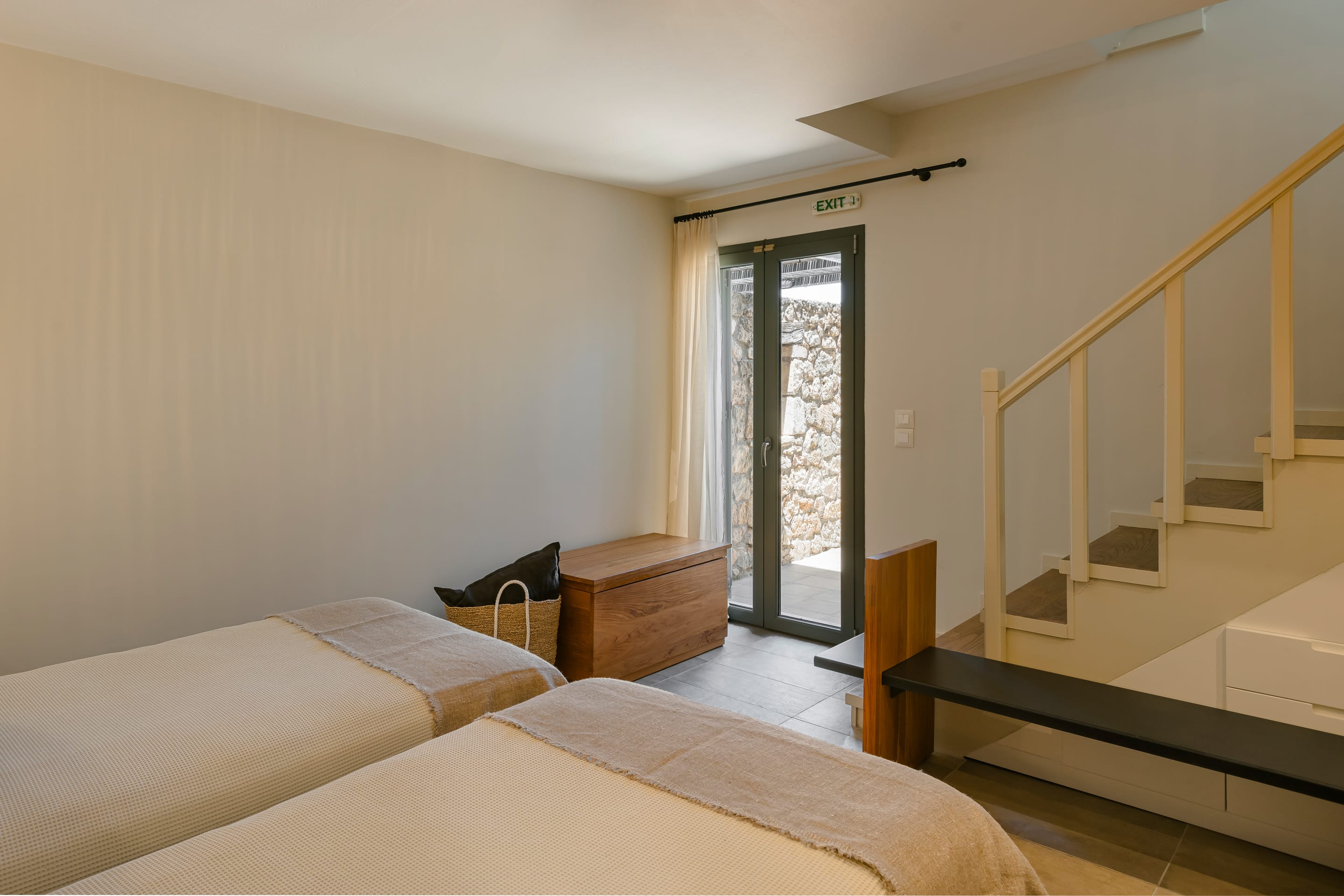 a room with a bed and a window