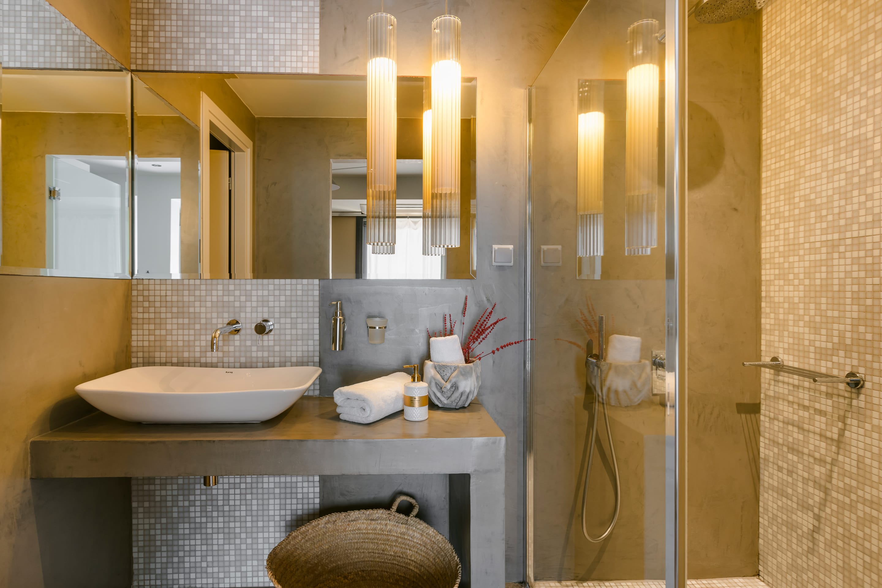 a bathroom with a sink and a shower unit