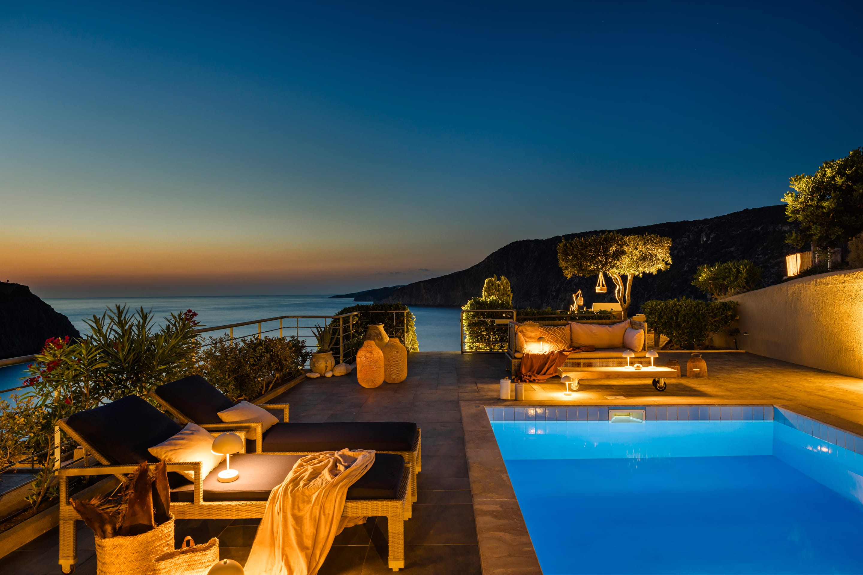 a pool with chairs around it