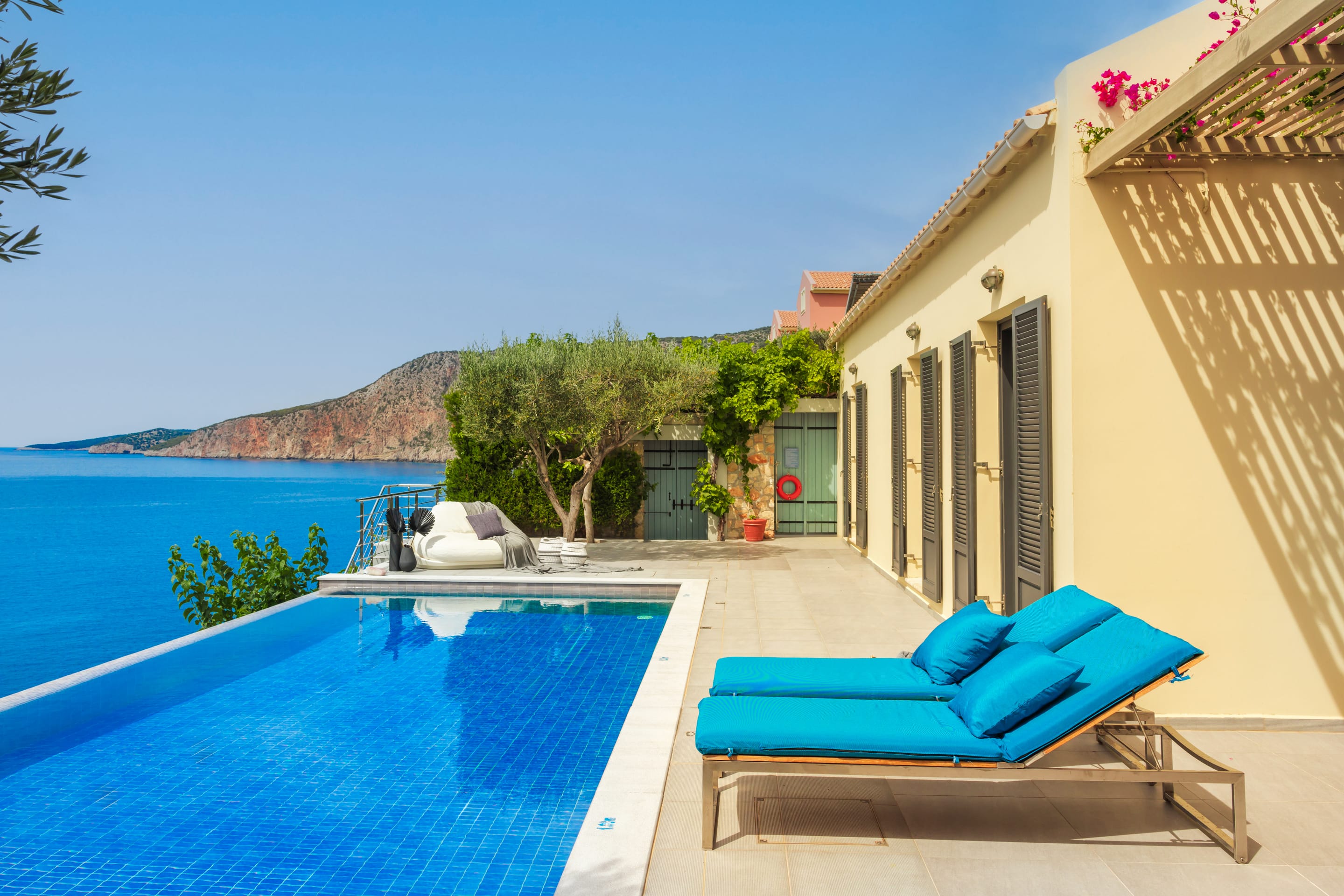 a pool next to a house