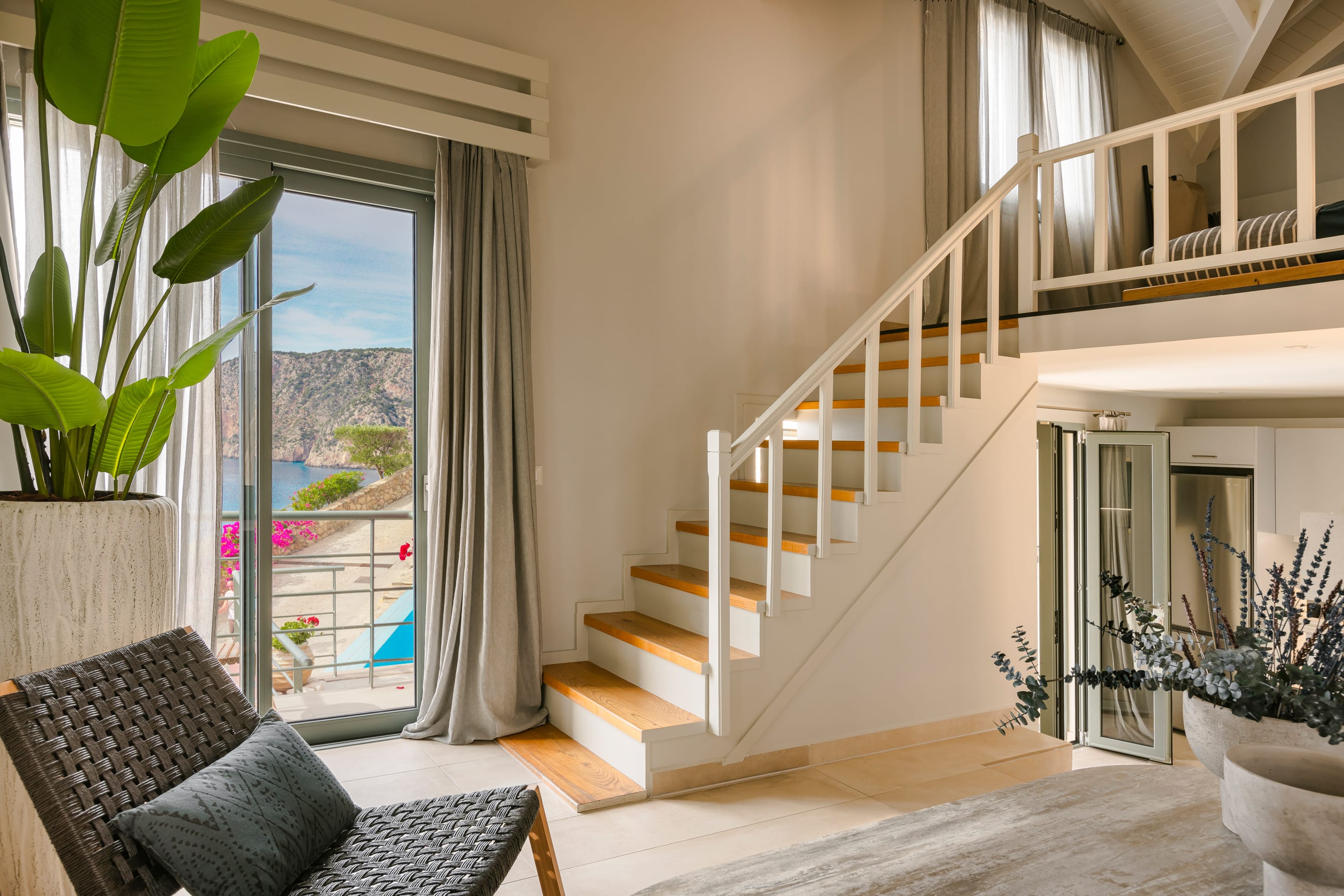 a staircase leading to a window