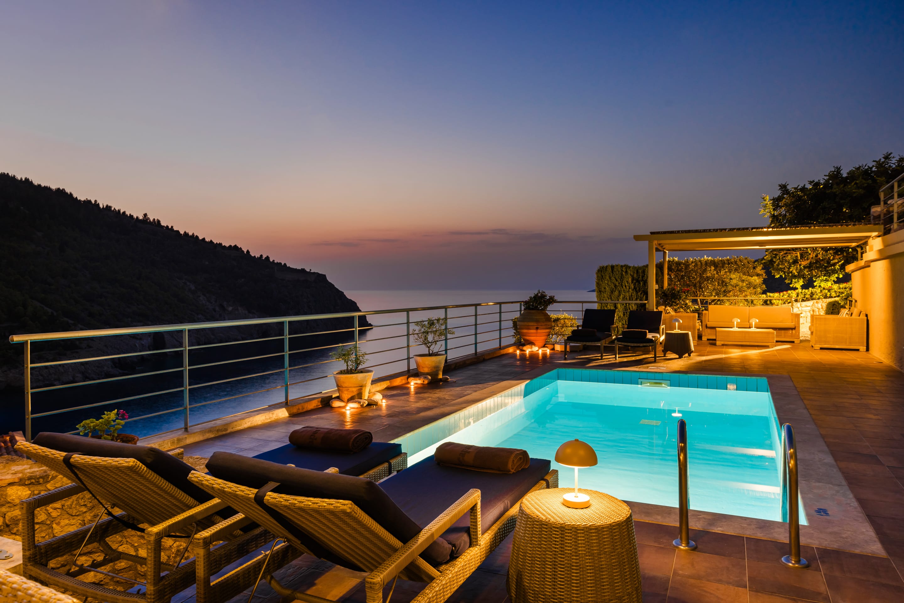 a pool with chairs around it