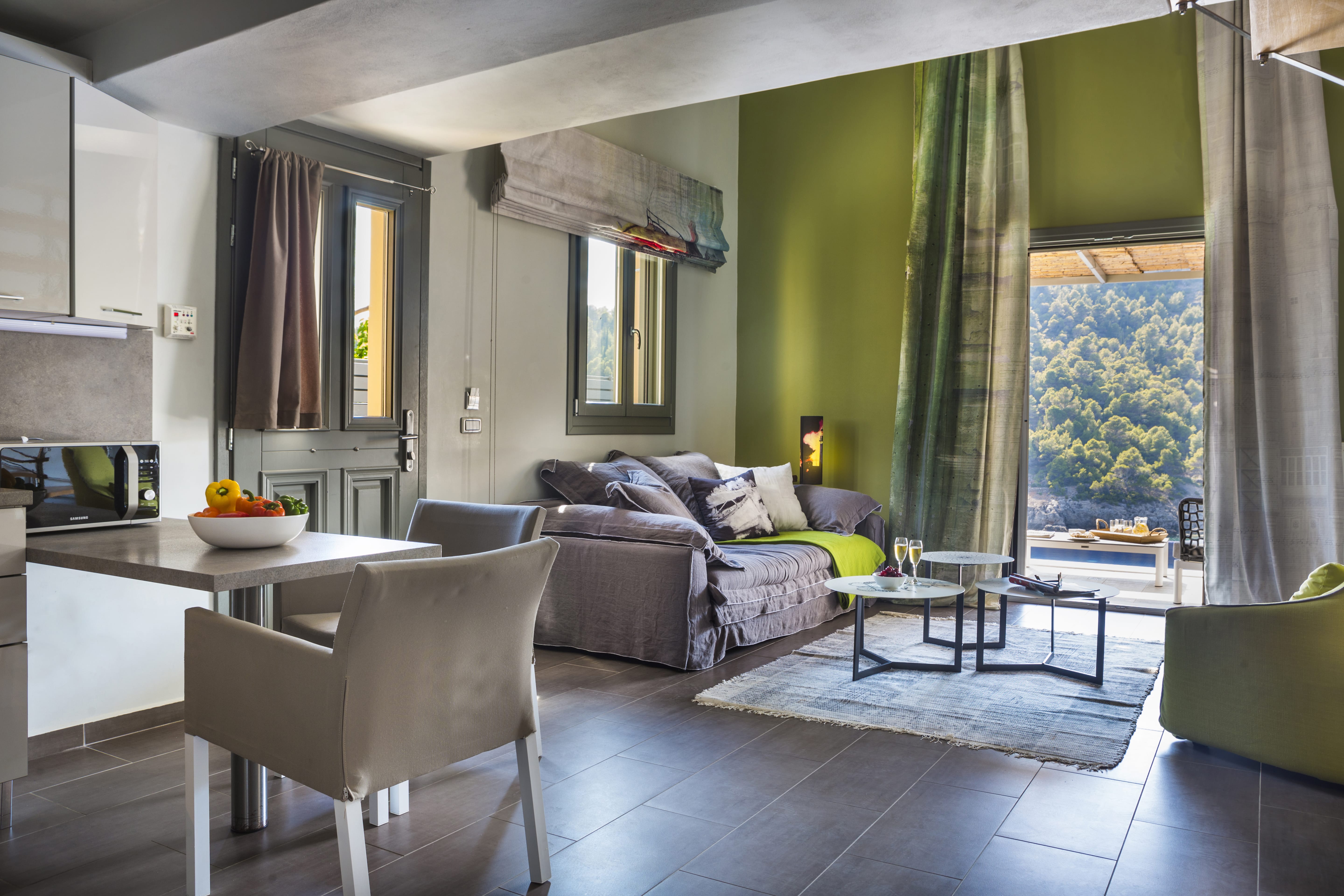 a living room with a bed and couch