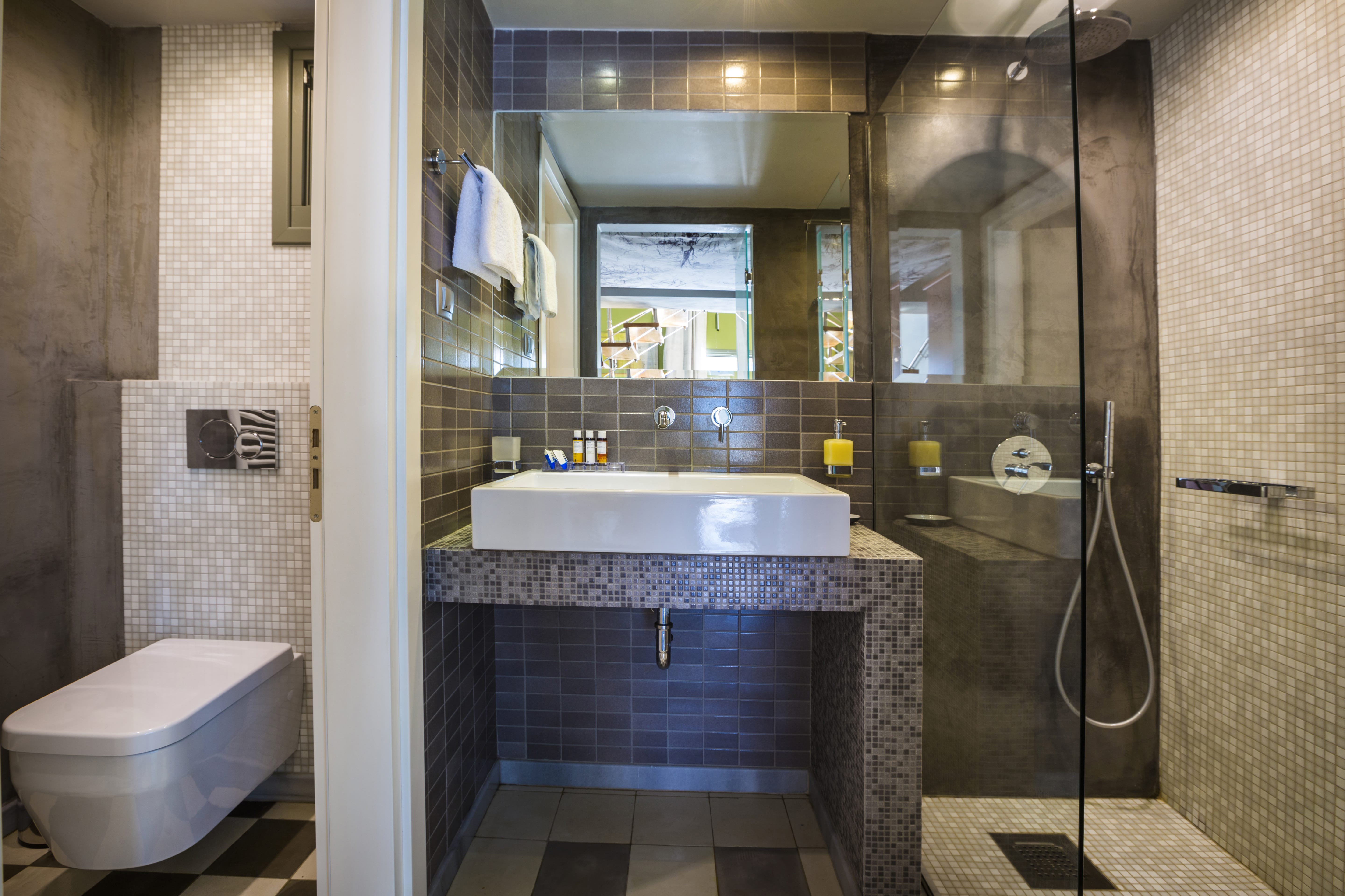 a bathroom with a large mirror