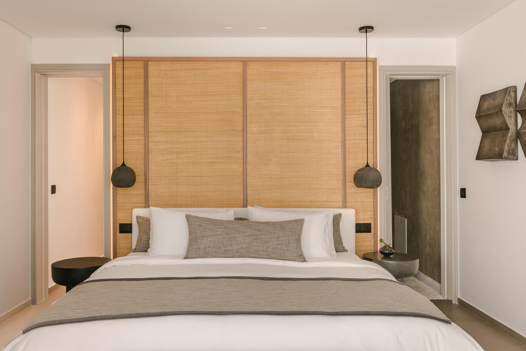 a bed with white sheets