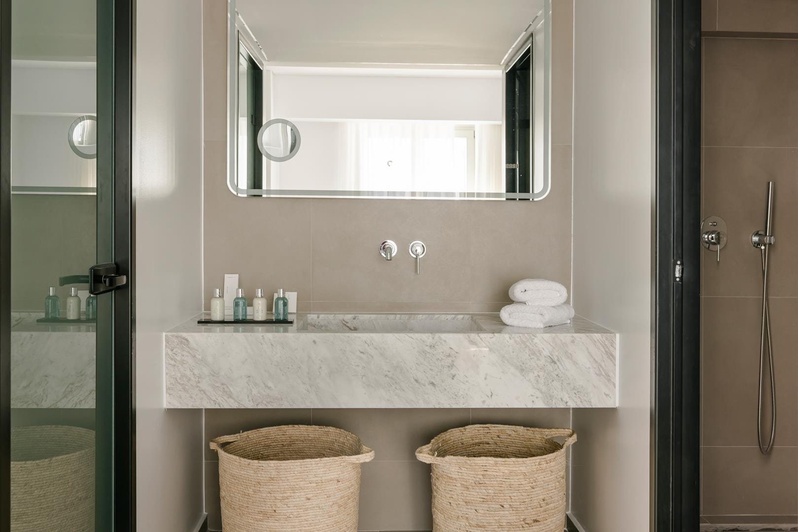 a bathroom with a large mirror