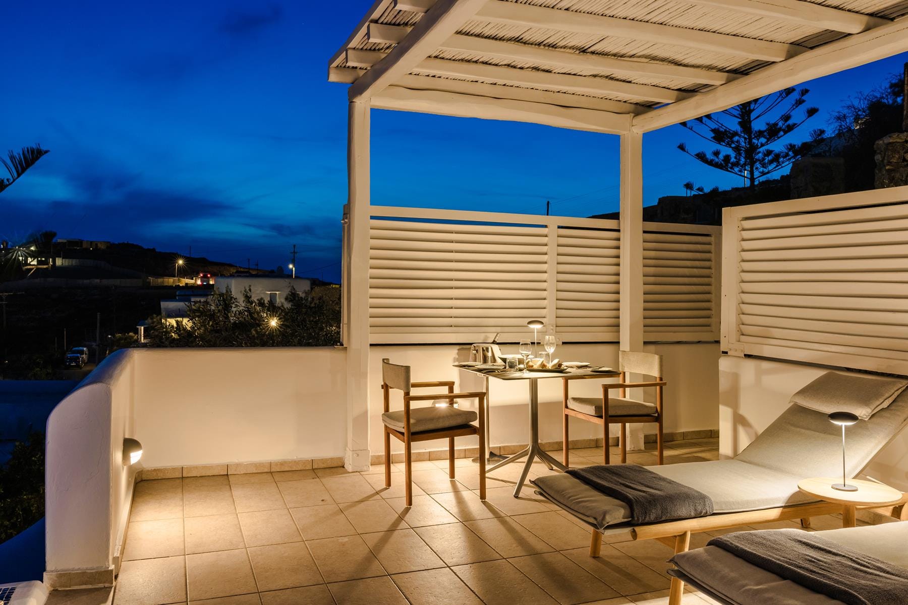 a table and chairs on a deck