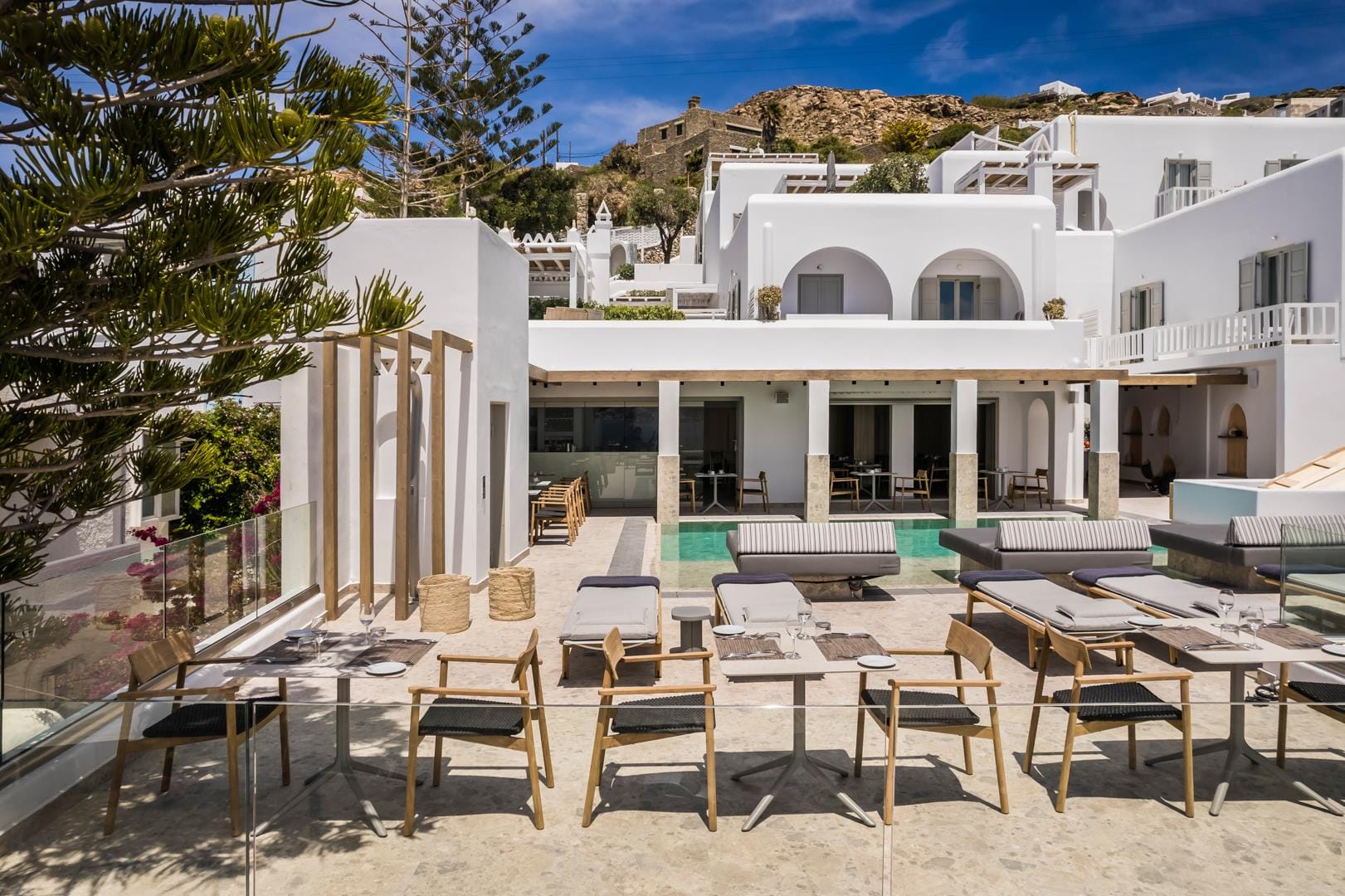 a house with a patio and tables
