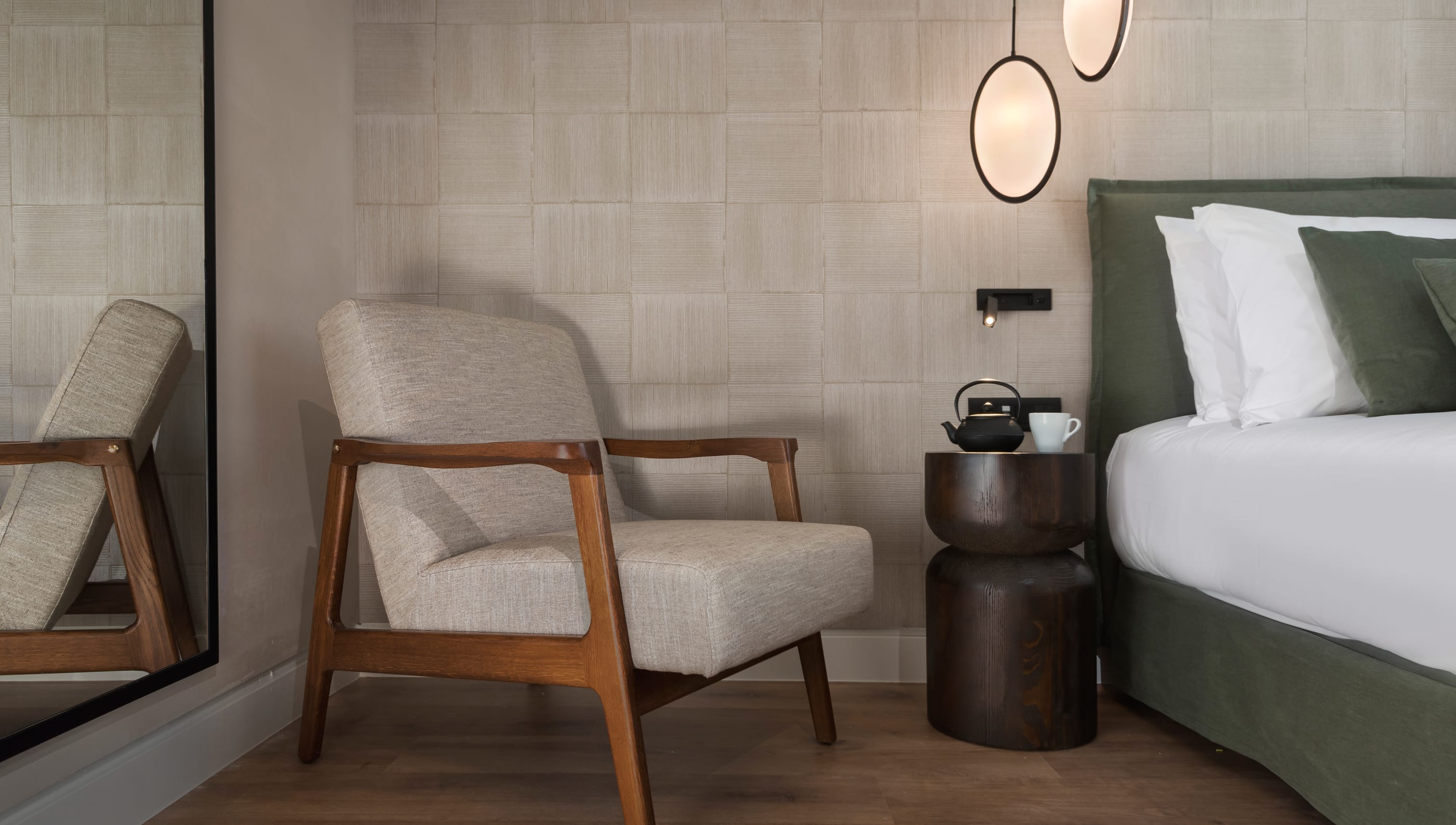 a room with a bed and a chair