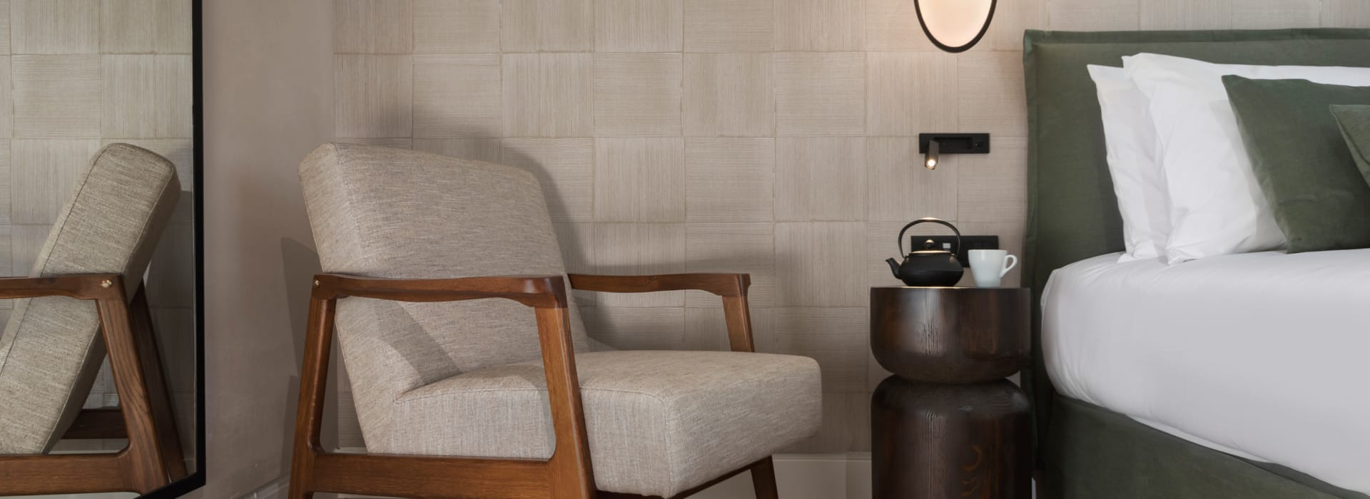 a room with a bed and a chair