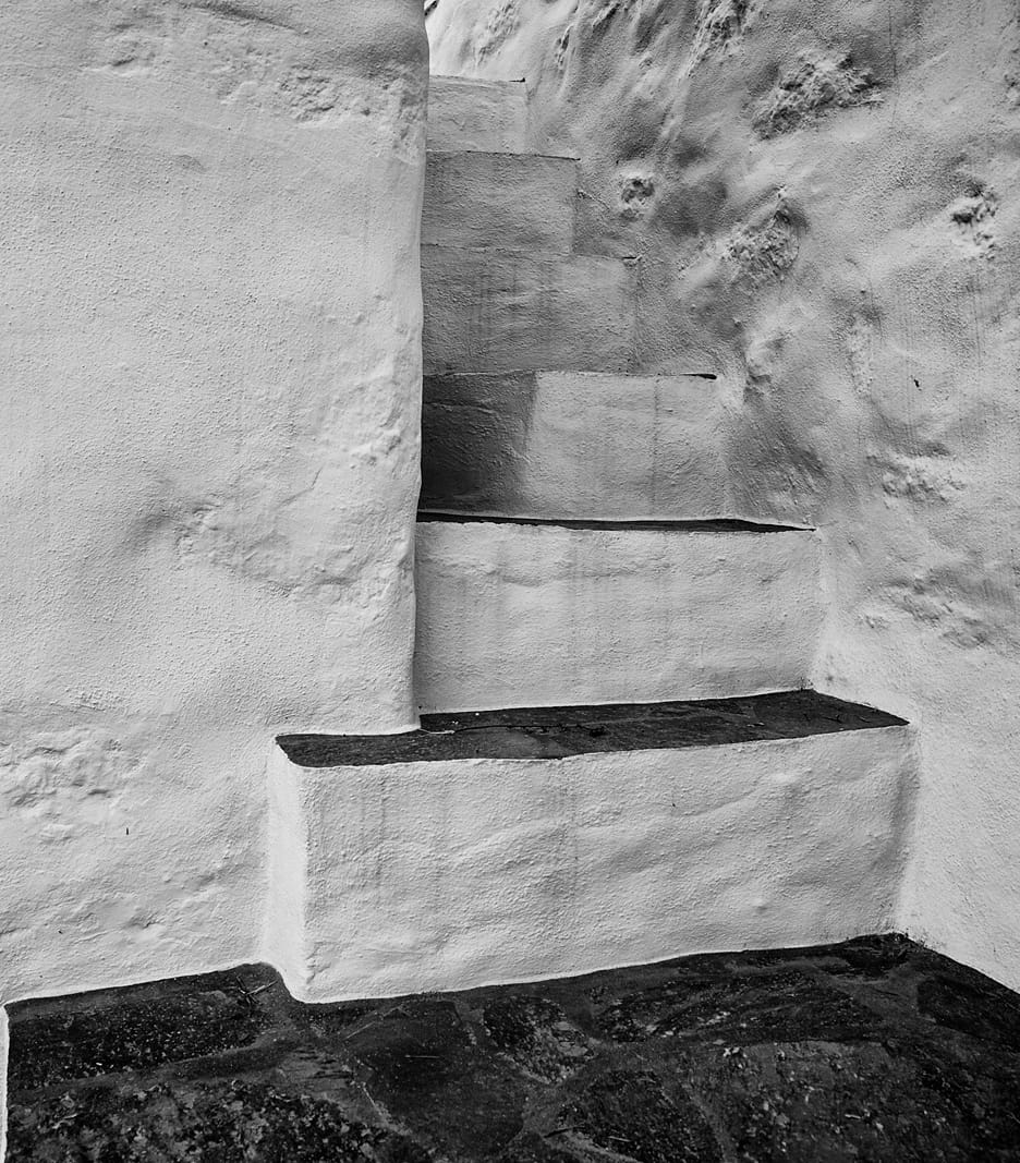 a staircase in a stone building