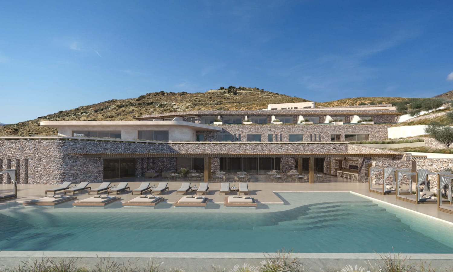 a building with a pool in front of it