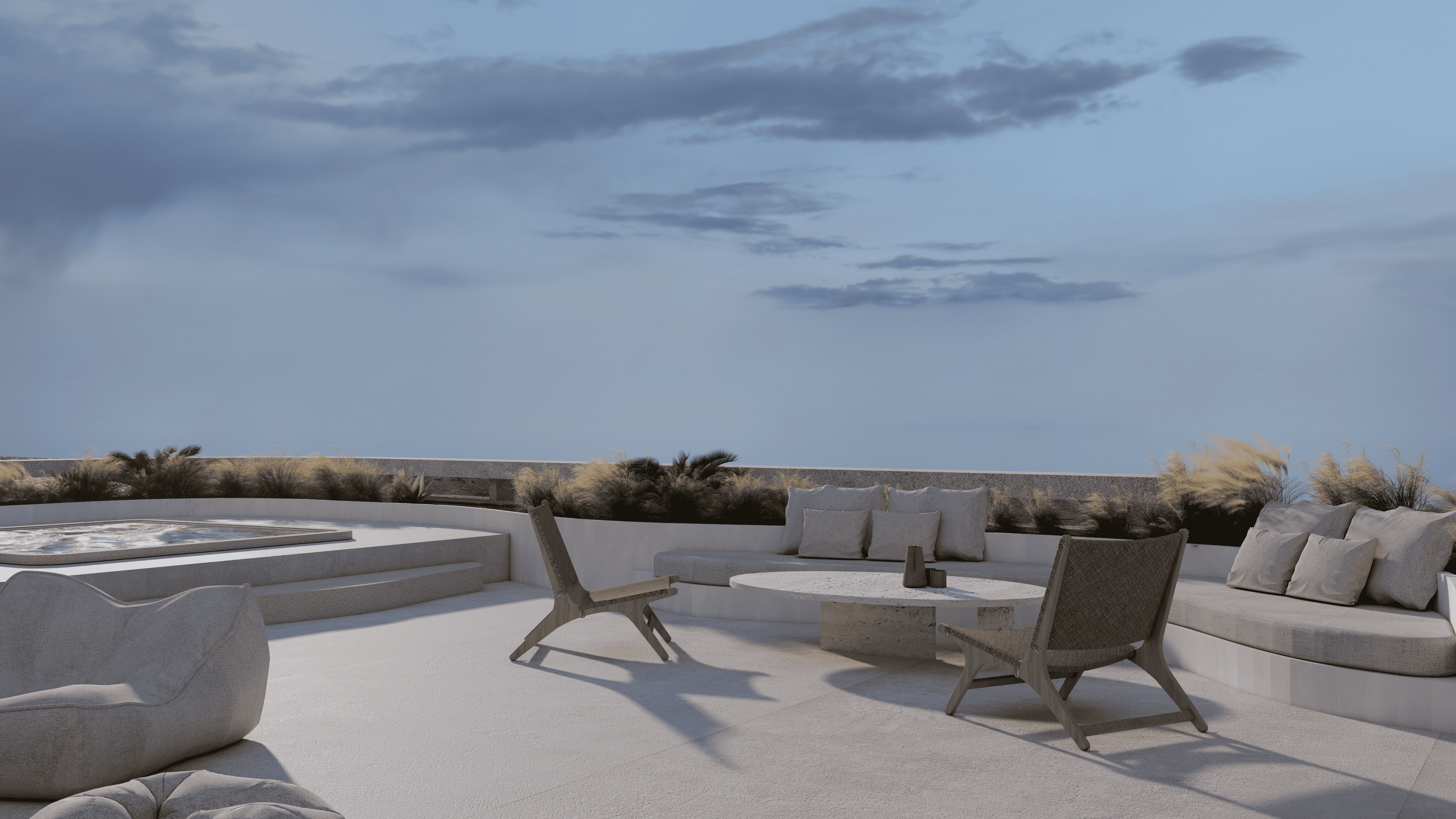 a group of chairs and a table on a beach