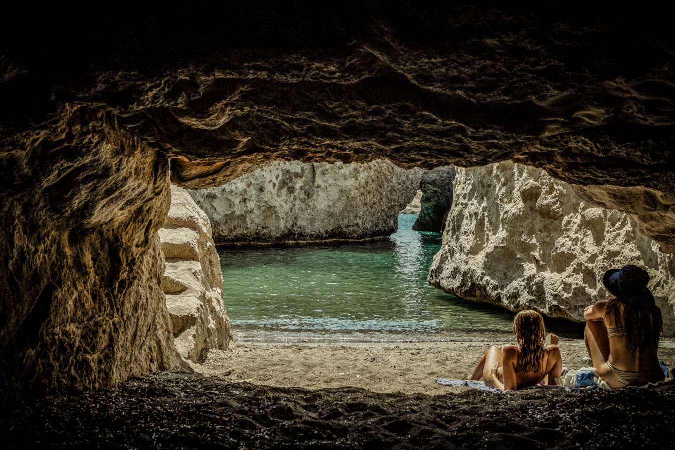 people sitting on a beach