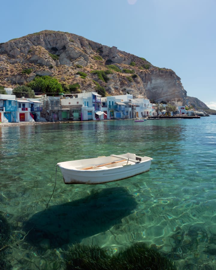 a boat sits in the water