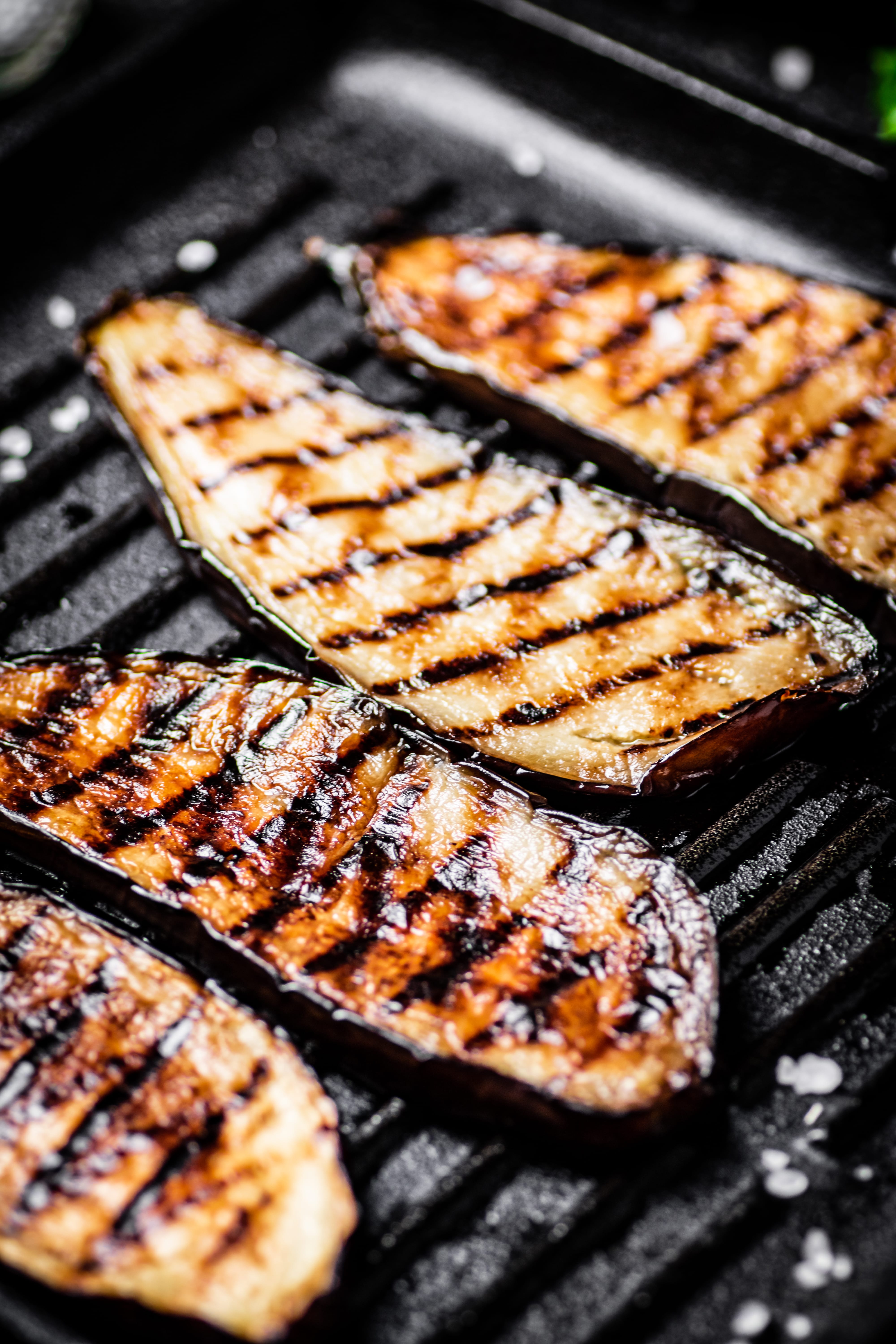 a group of ribs on a grill