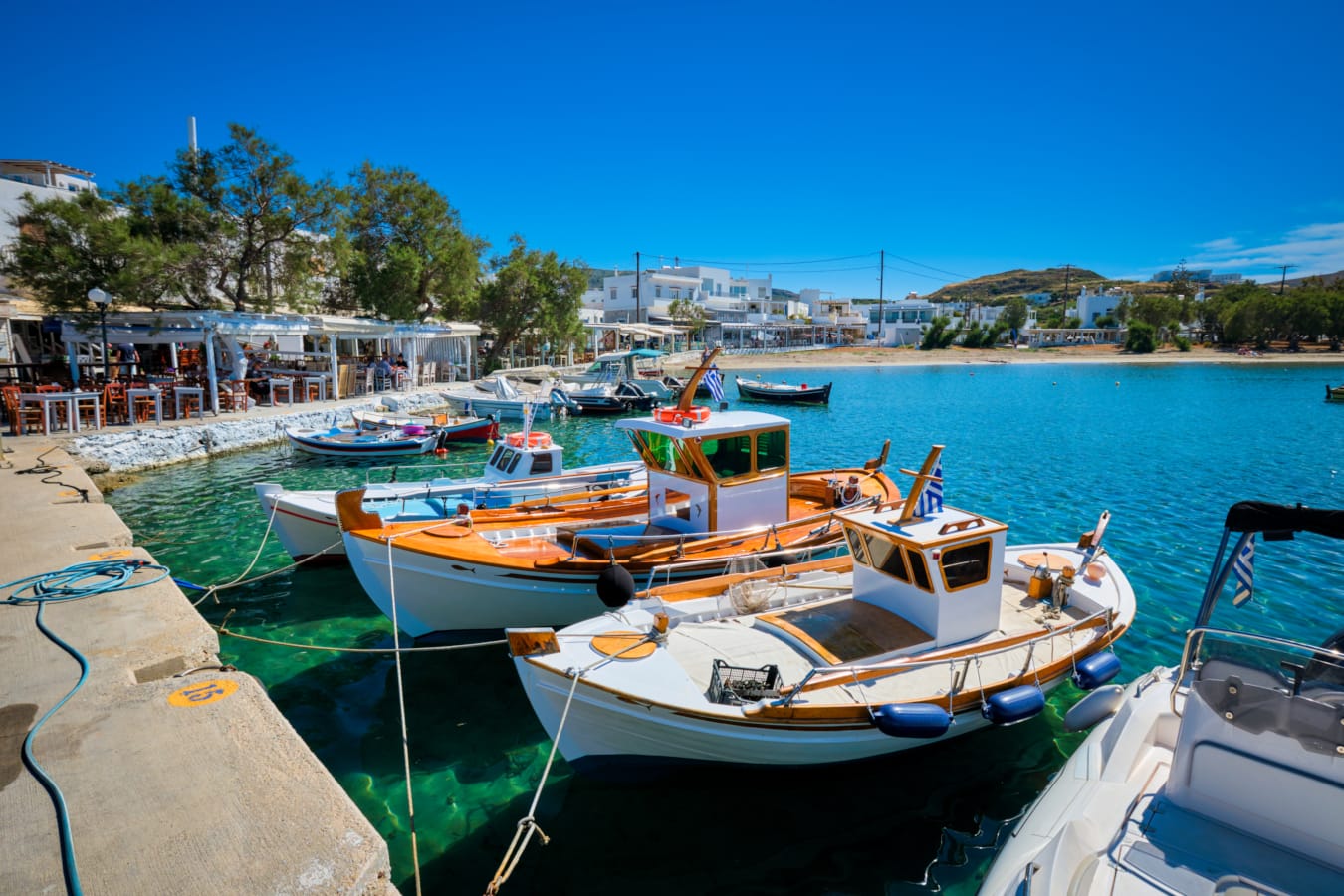 boats docked at a pier