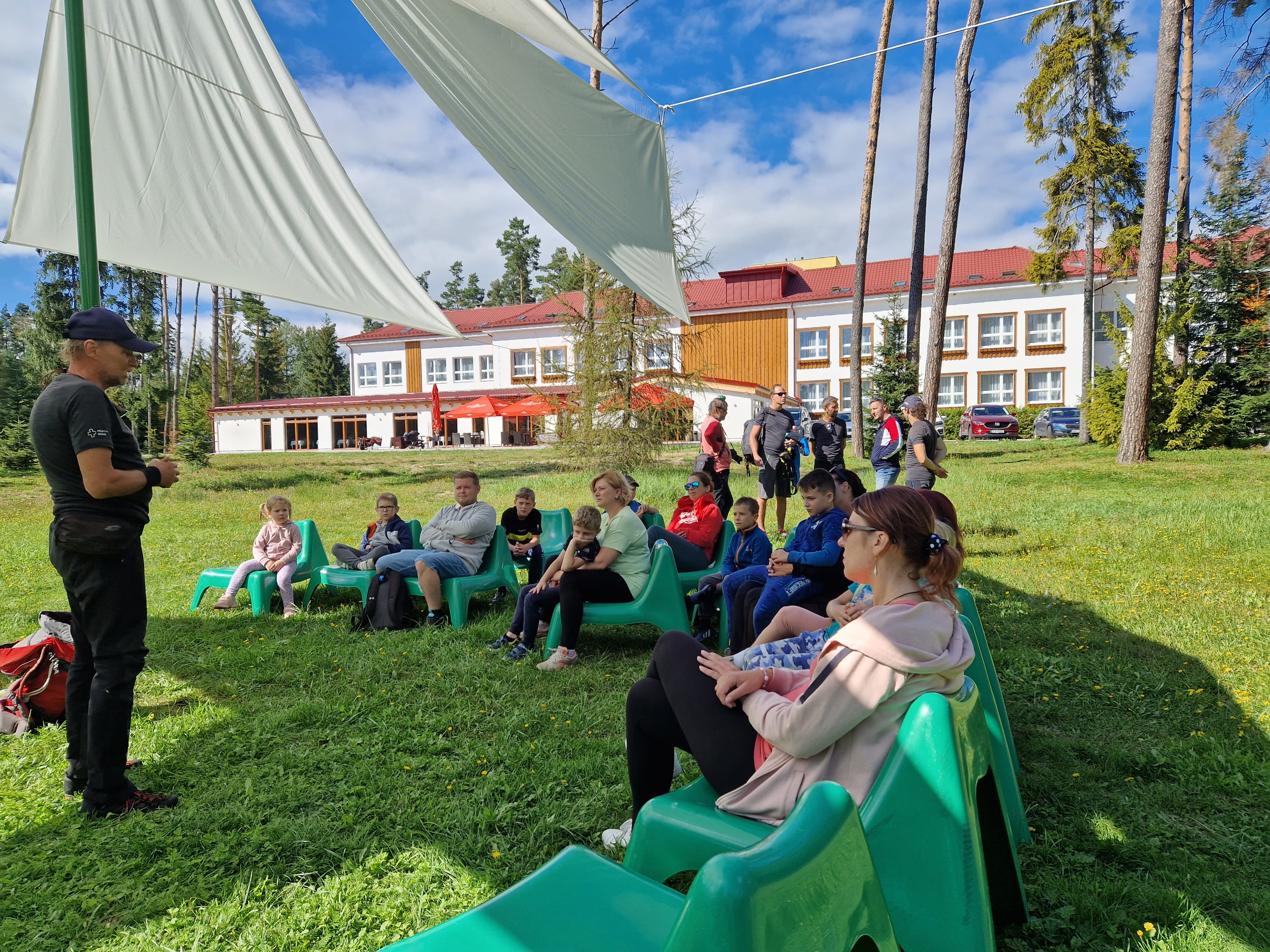 a group of people sitting in chairs