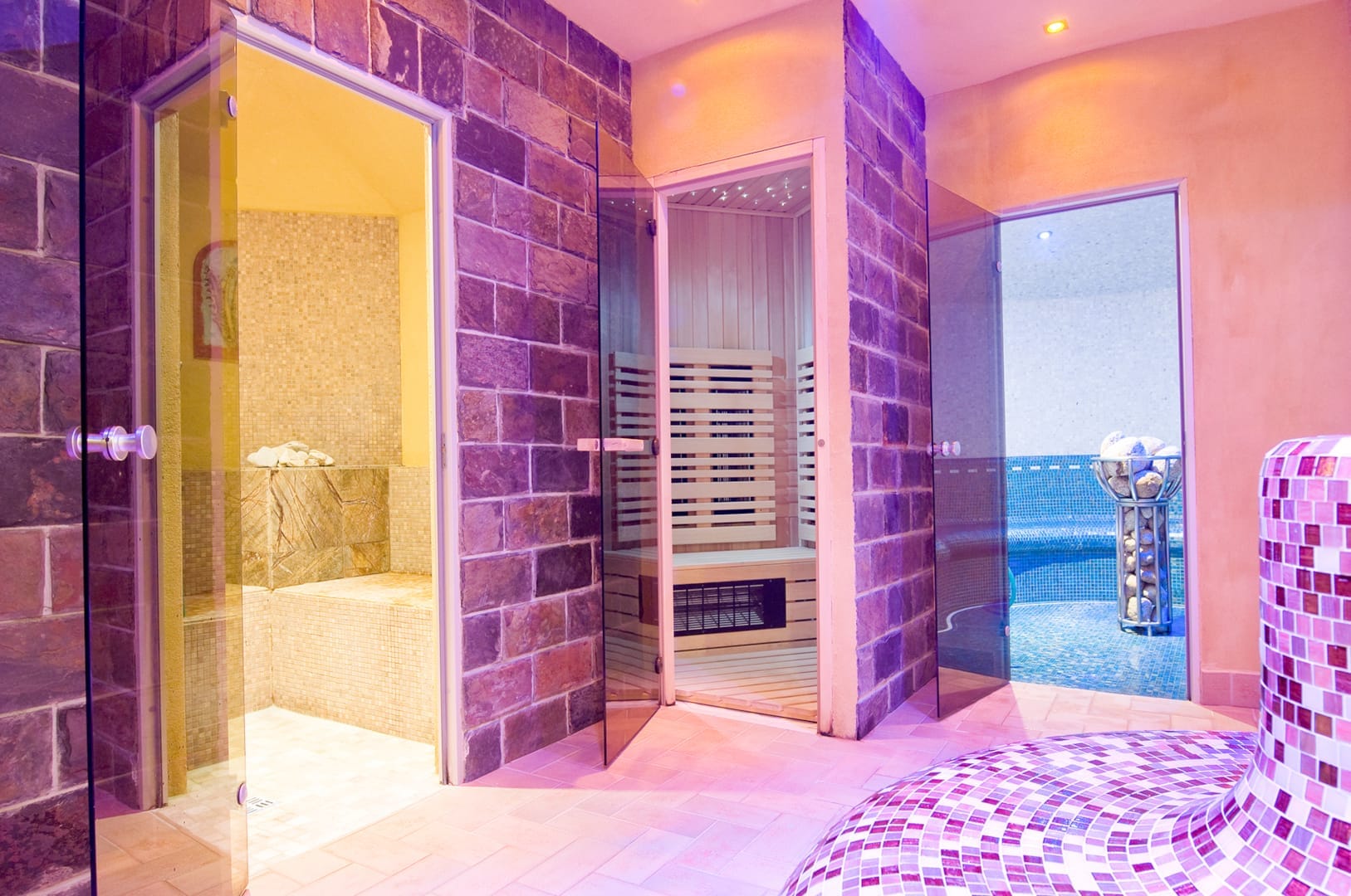 a bathroom with a glass door