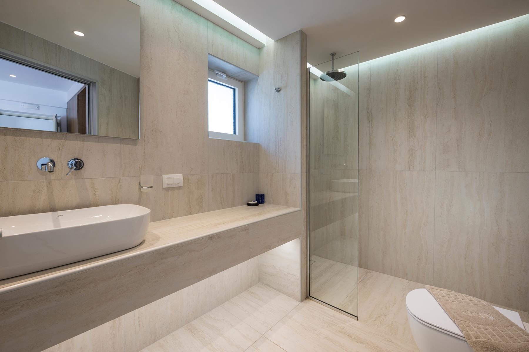 a bathroom with a glass shower