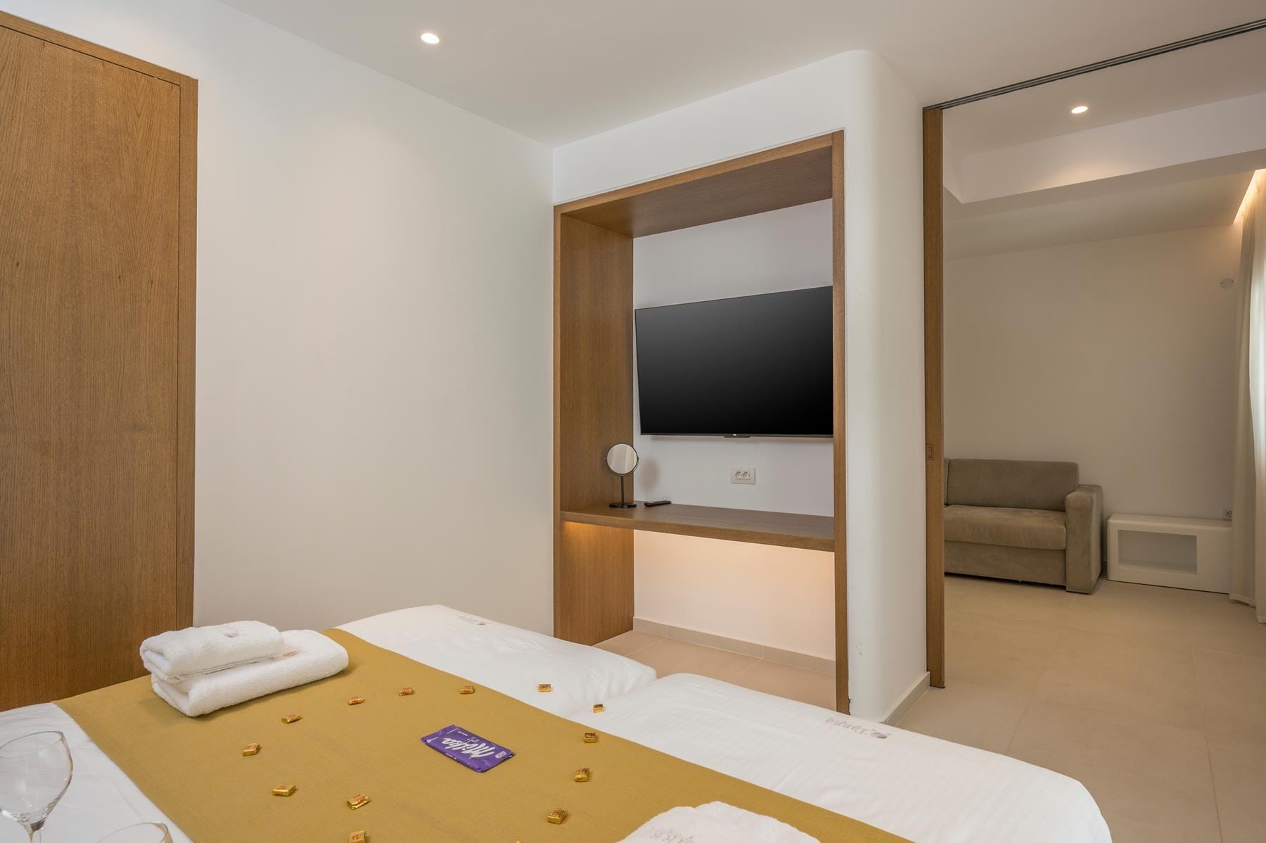 a room with a tv and a couch